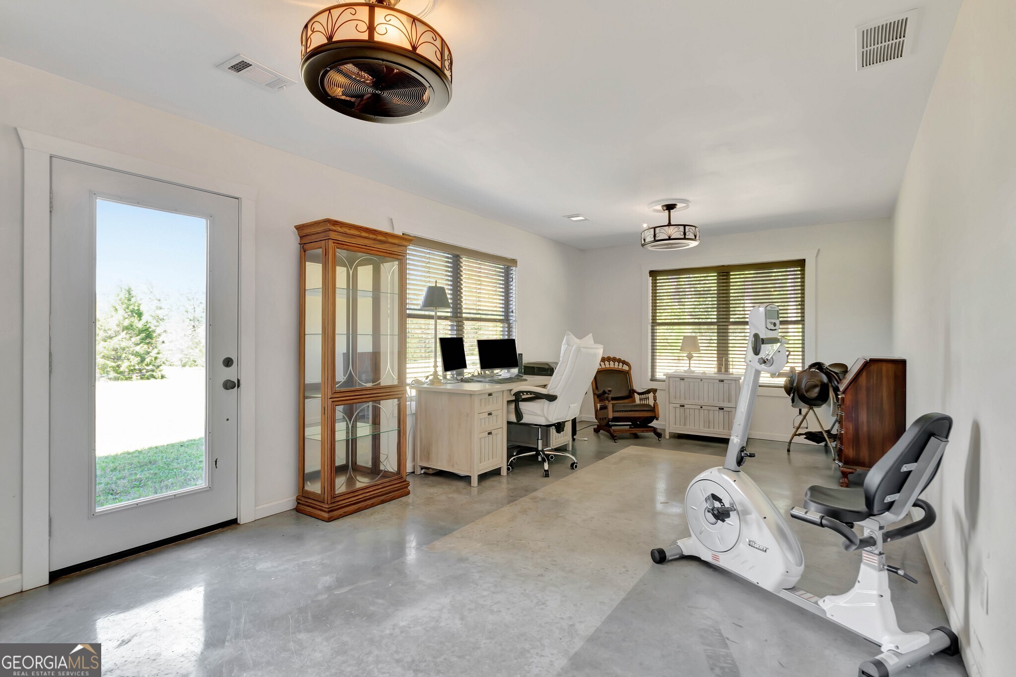 860 North Walker's Mill Road Griffin, GA 30223 - Photo 30 of 116 a living room with furniture and a window