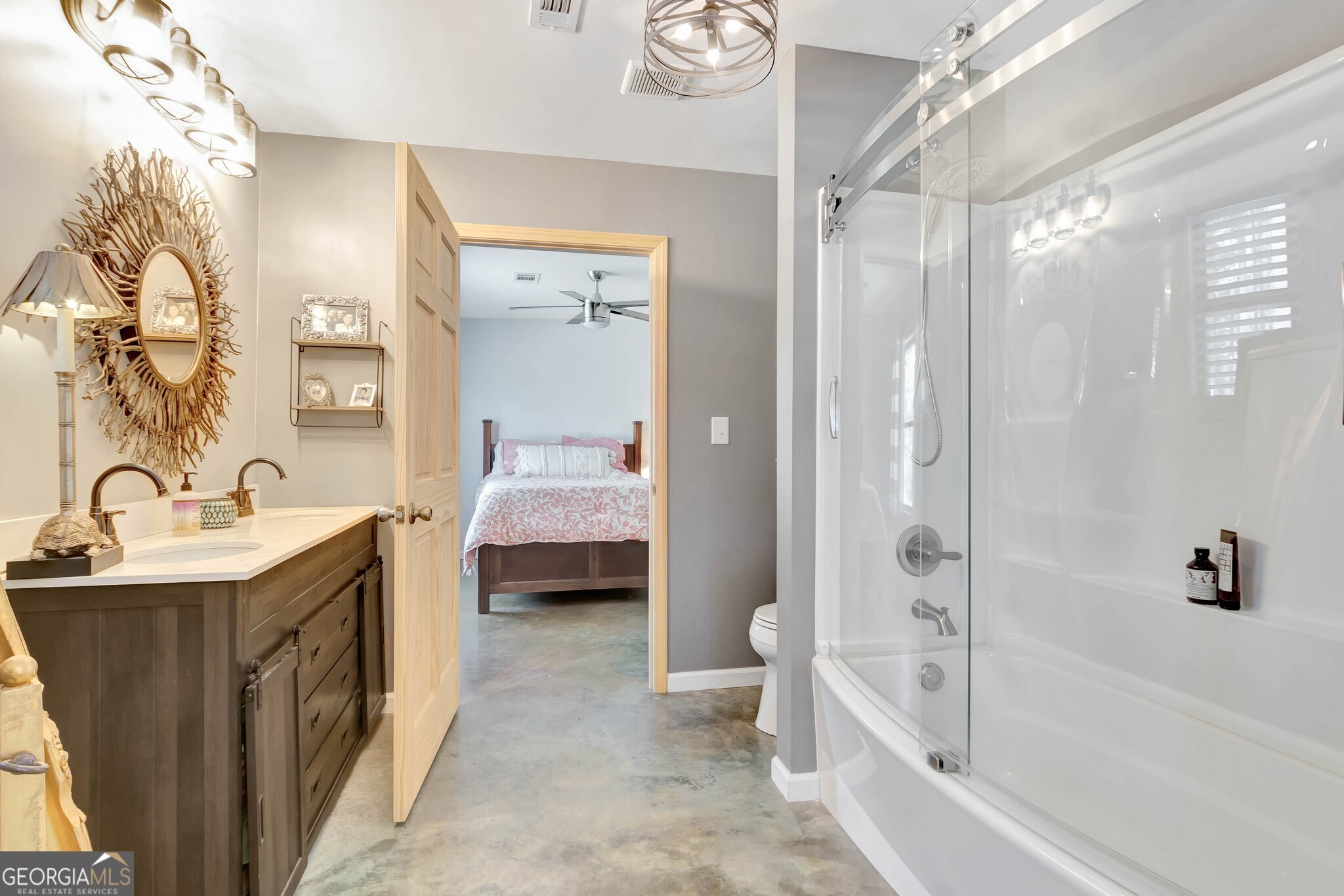 860 North Walker's Mill Road Griffin, GA 30223 - Photo 34 of 116 a spacious bathroom with a tub sink a toilet and a shower
