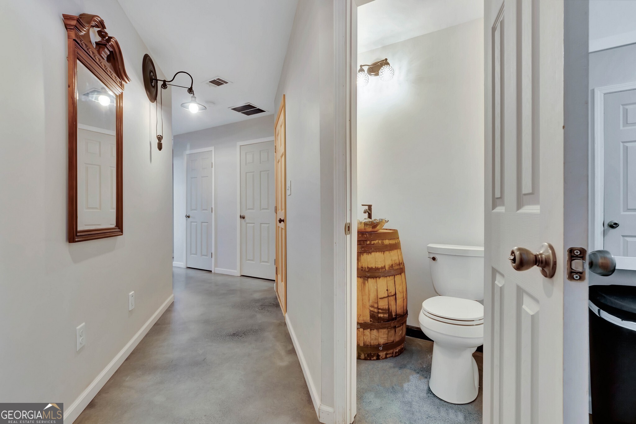 860 North Walker's Mill Road Griffin, GA 30223 - Photo 41 of 116 a bathroom with a toilet and a shower