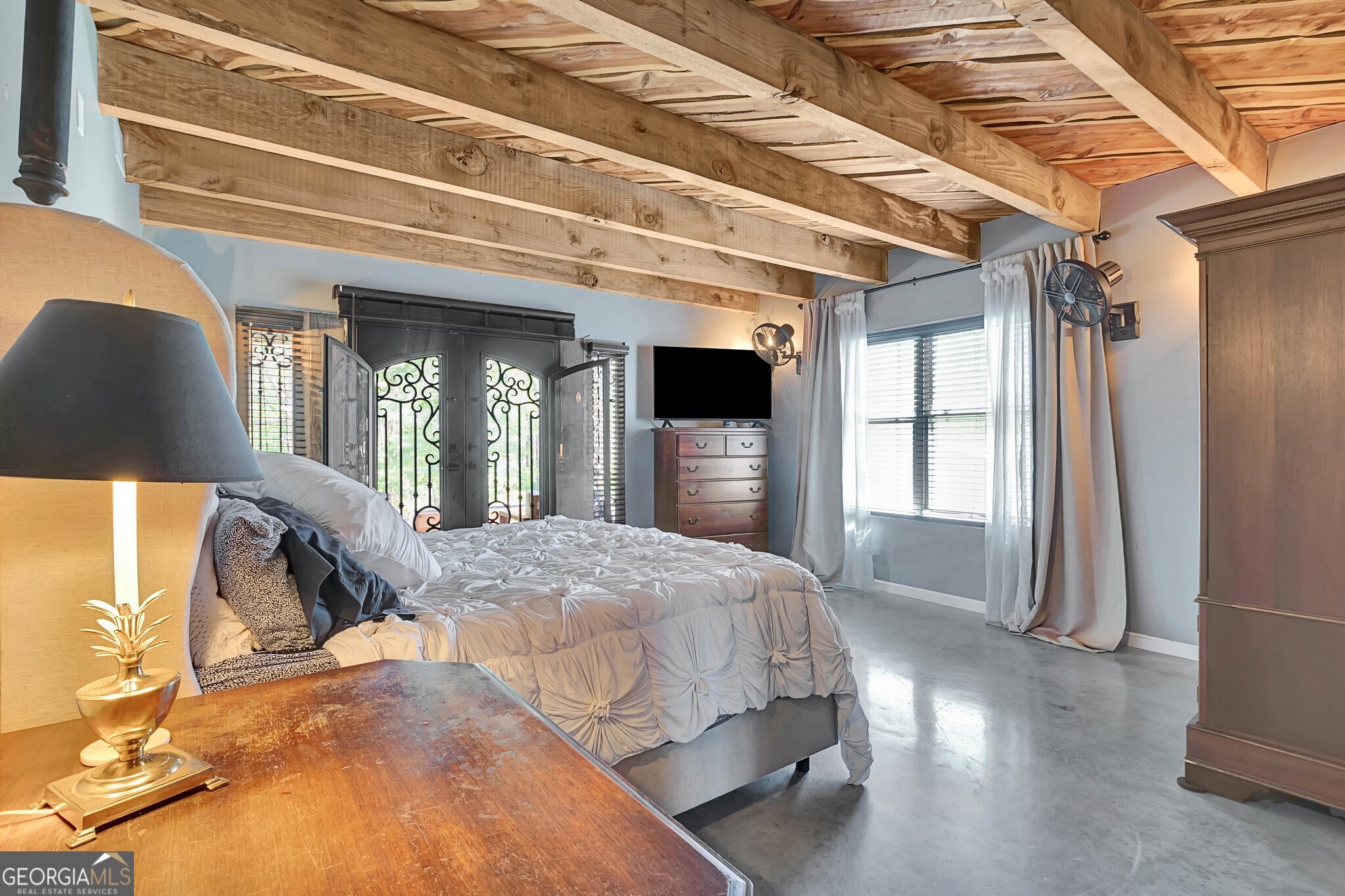 860 North Walker's Mill Road Griffin, GA 30223 - Photo 45 of 116 a bedroom with a bed next to a window with outer view