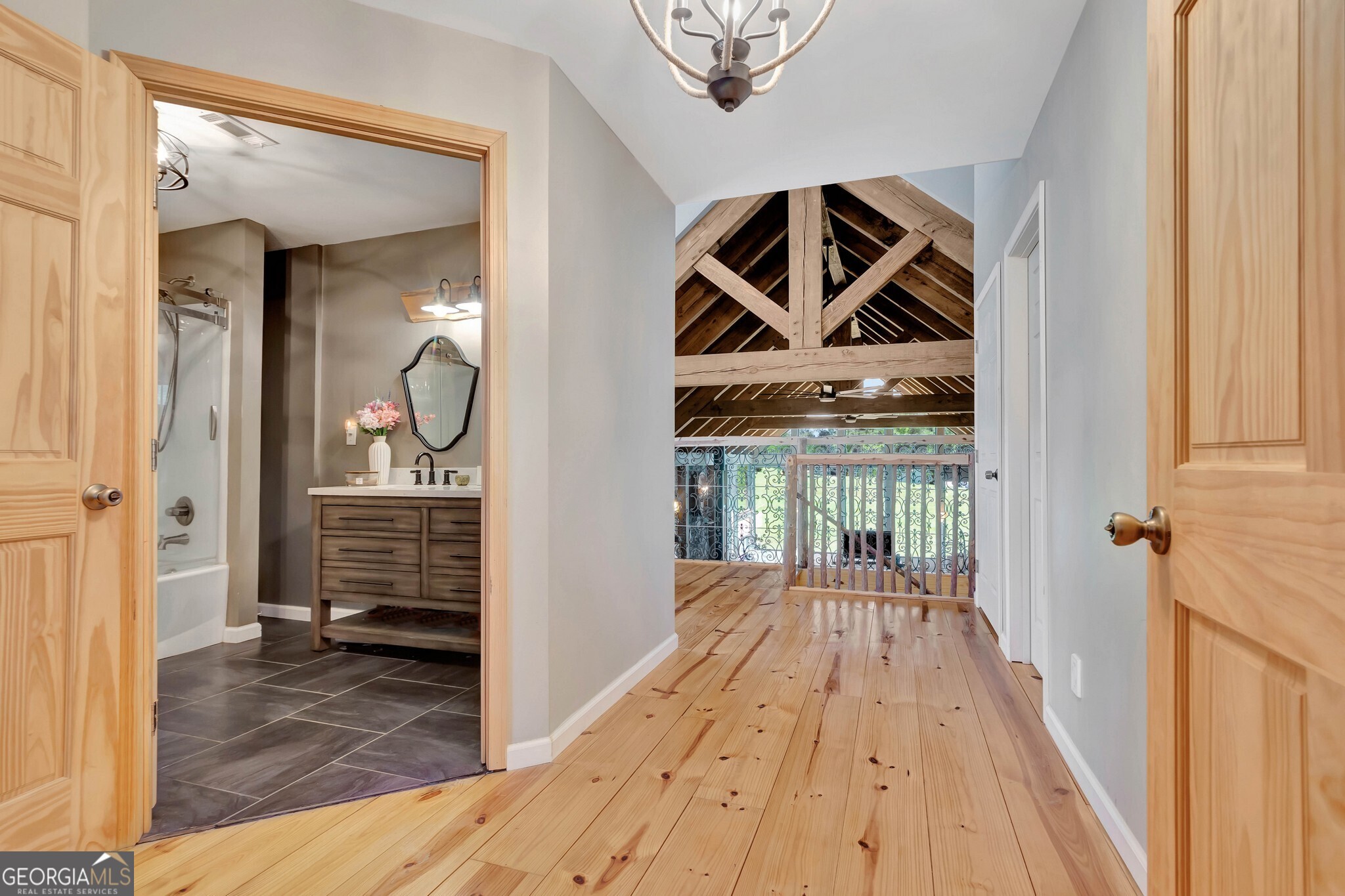 860 North Walker's Mill Road Griffin, GA 30223 - Photo 57 of 116 a view of a hallway view with wooden floor and staircase