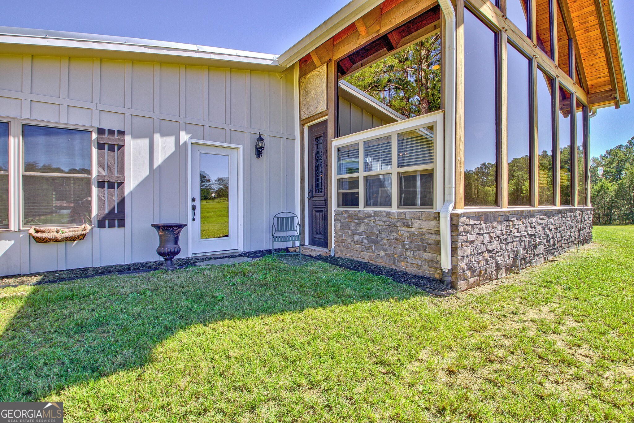 860 North Walker's Mill Road Griffin, GA 30223 - Photo 64 of 116 a view of a house with backyard and a porch