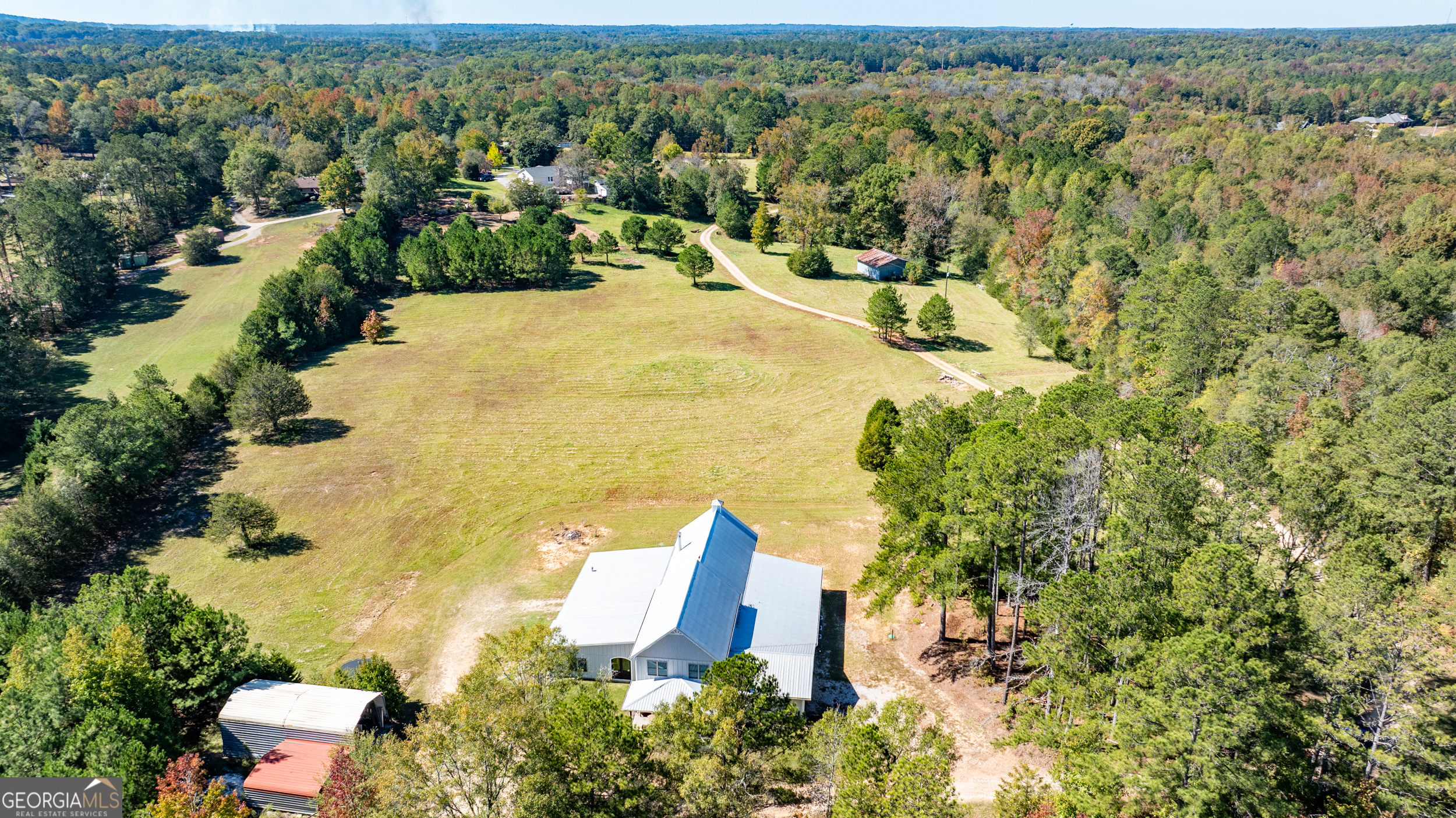 860 North Walker's Mill Road Griffin, GA 30223 - Photo 80 of 116 an aerial view of residential house with outdoor space and swimming pool