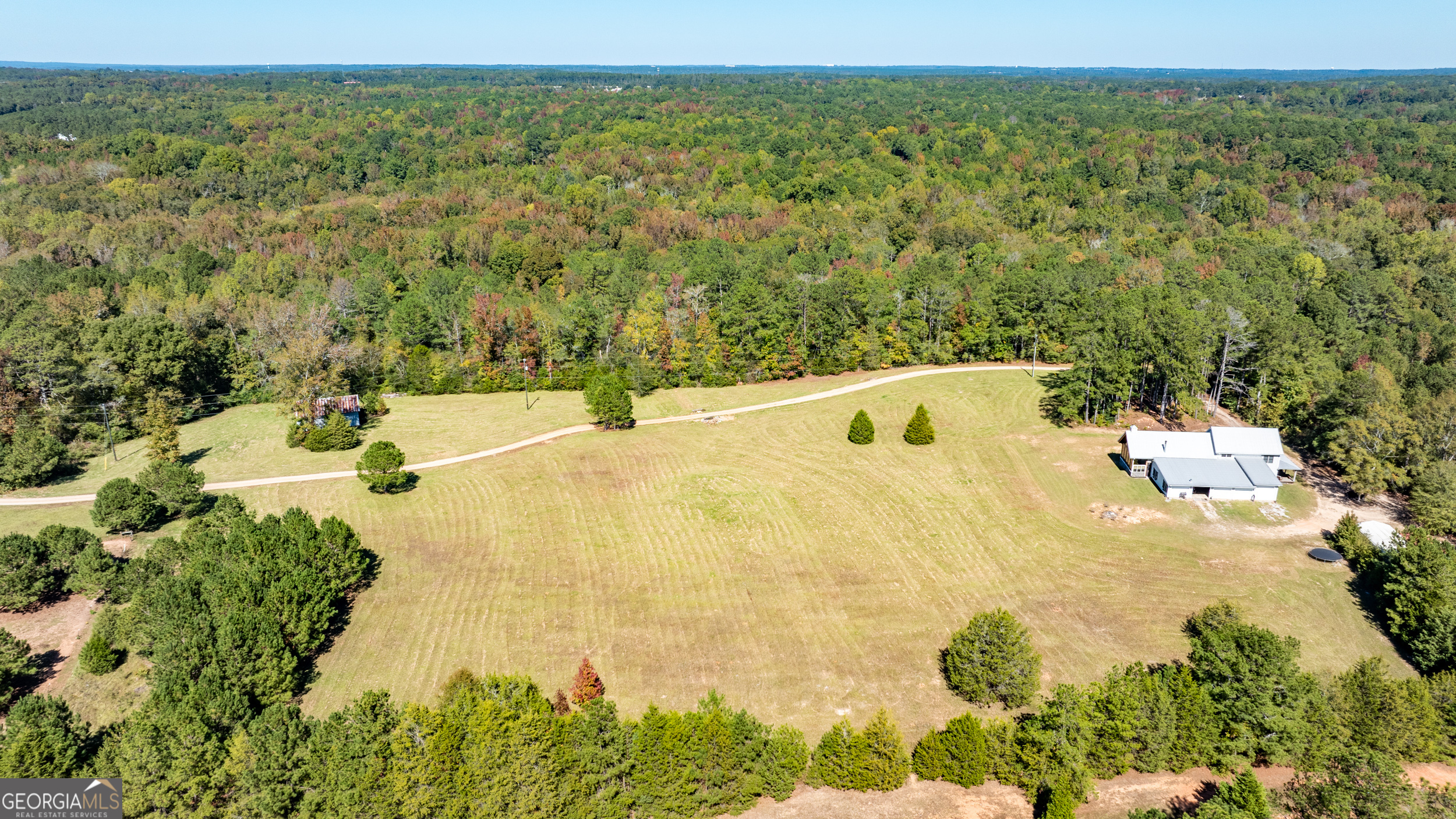 860 North Walker's Mill Road Griffin, GA 30223 - Photo 85 of 116 a bathroom with a bathtub and shower