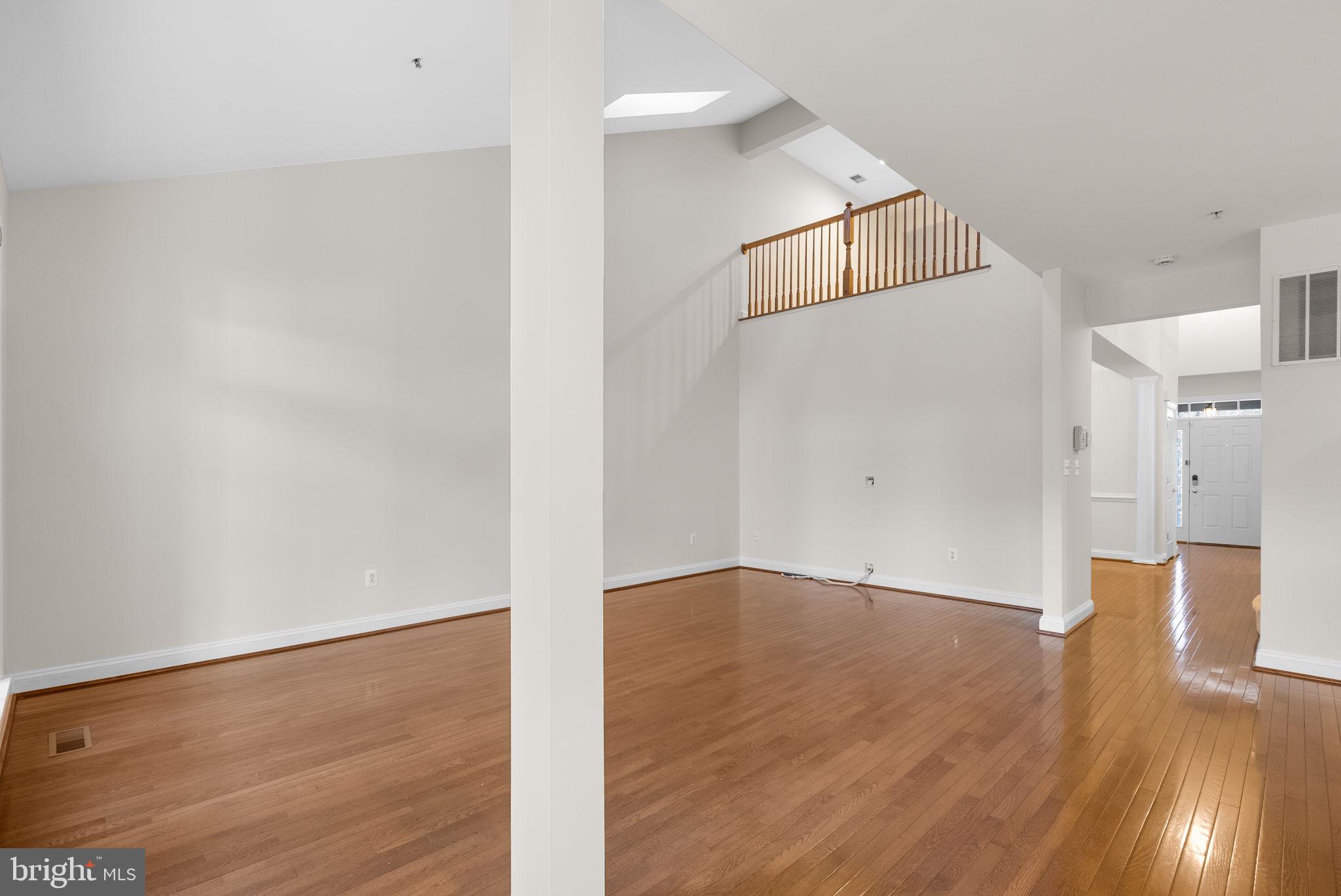 2788 Westminster Road Ellicott City, MD 21043 - Photo 13 of 75 a view of an empty room with wooden floor