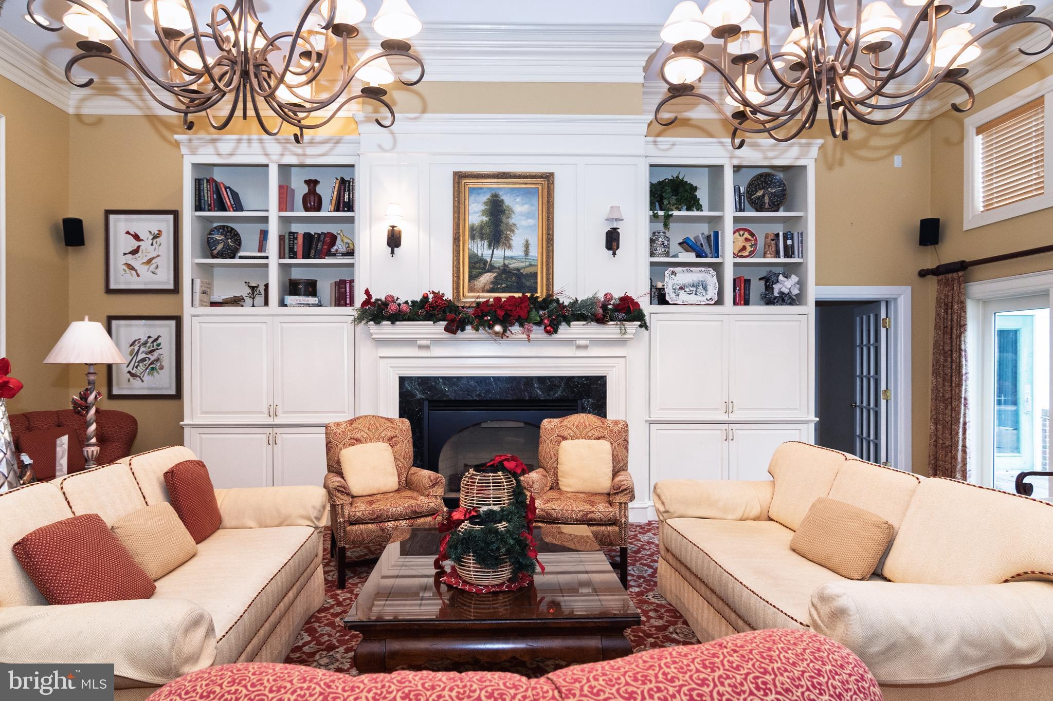 2788 Westminster Road Ellicott City, MD 21043 - Photo 64 of 75 a living room with furniture and a fireplace