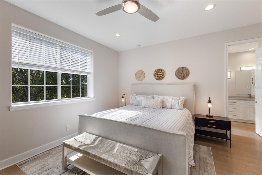 8035 St Simons Street, Unit 8035 University Park, FL 34201 - Photo 14 of 33 a bedroom with a bed and a window