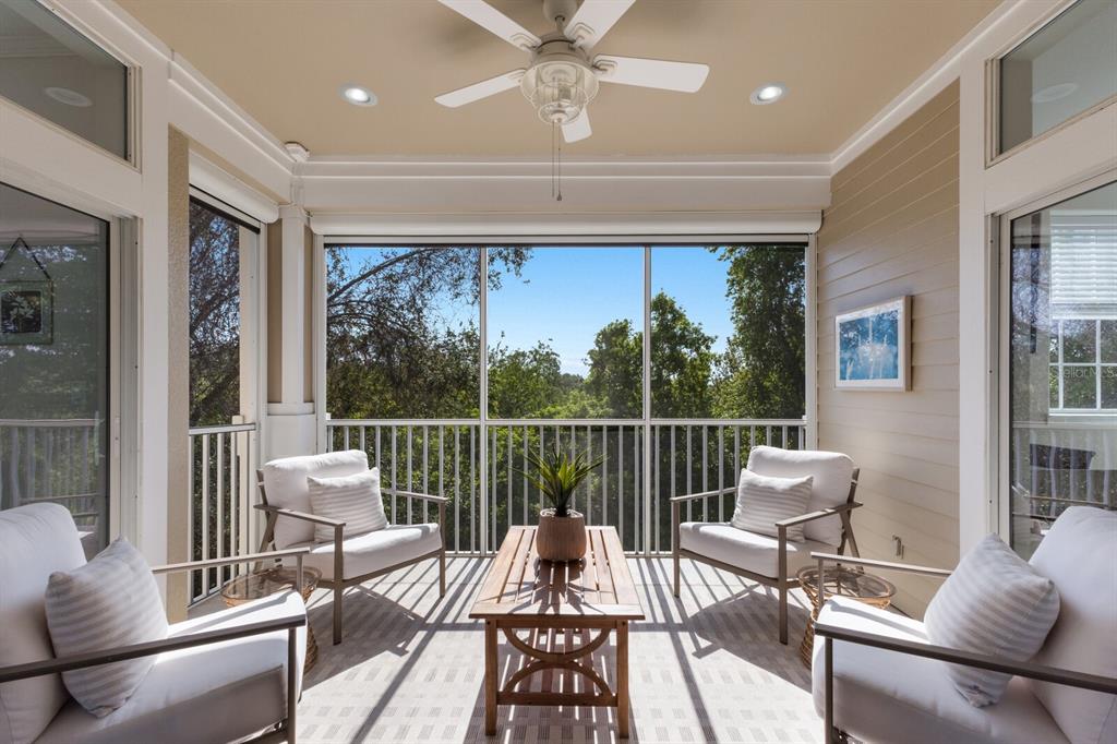 8035 St Simons Street, Unit 8035 University Park, FL 34201 - Photo 24 of 33 a living room with furniture and a large window