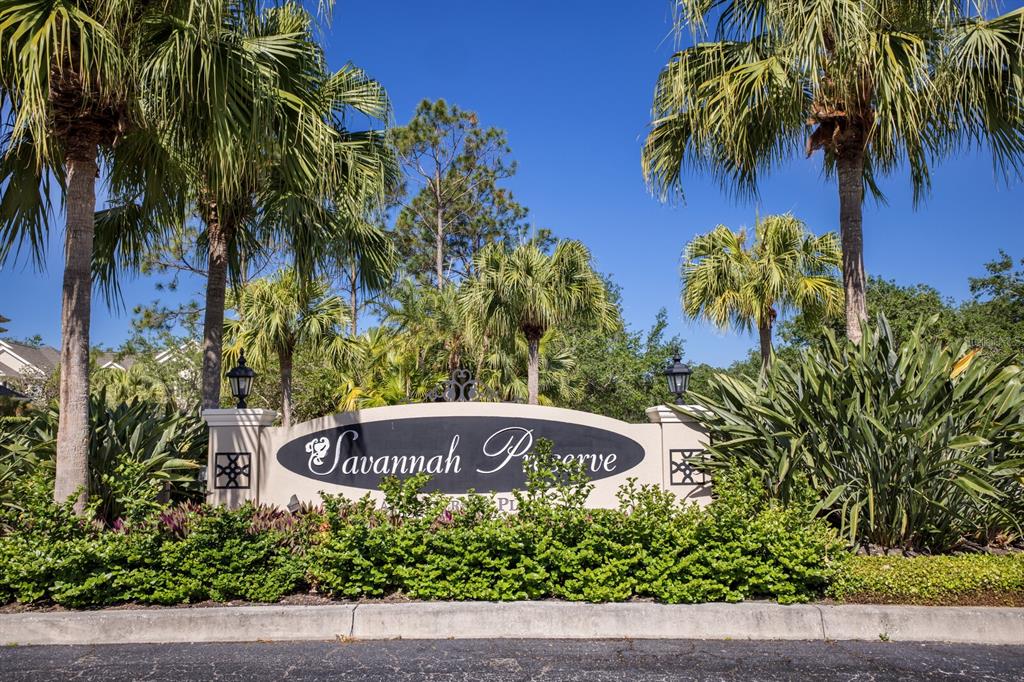 8035 St Simons Street, Unit 8035 University Park, FL 34201 - Photo 29 of 33 a street sign that is sitting in front of a house