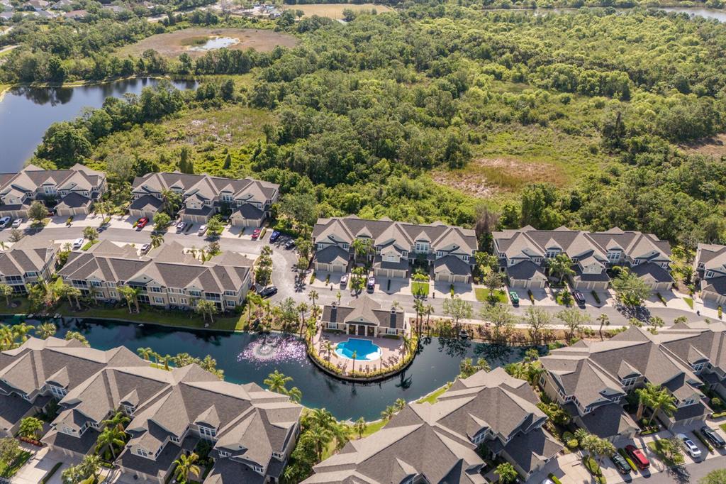 8035 St Simons Street, Unit 8035 University Park, FL 34201 - Photo 32 of 33 an aerial view of a house with garden space and lake view