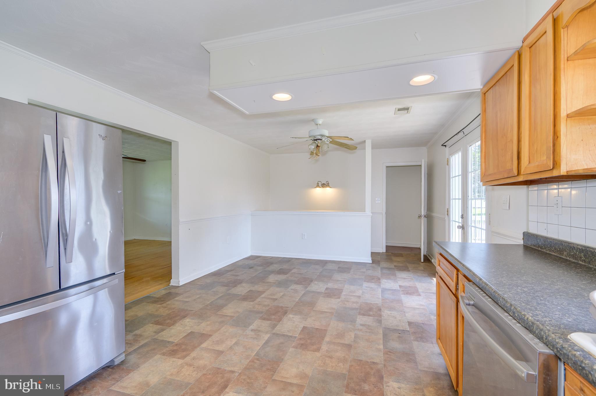 3208 Old Leetown Pike Ranson, WV 25438 - Photo 17 of 48 a view of a kitchen with a sink and cabinets