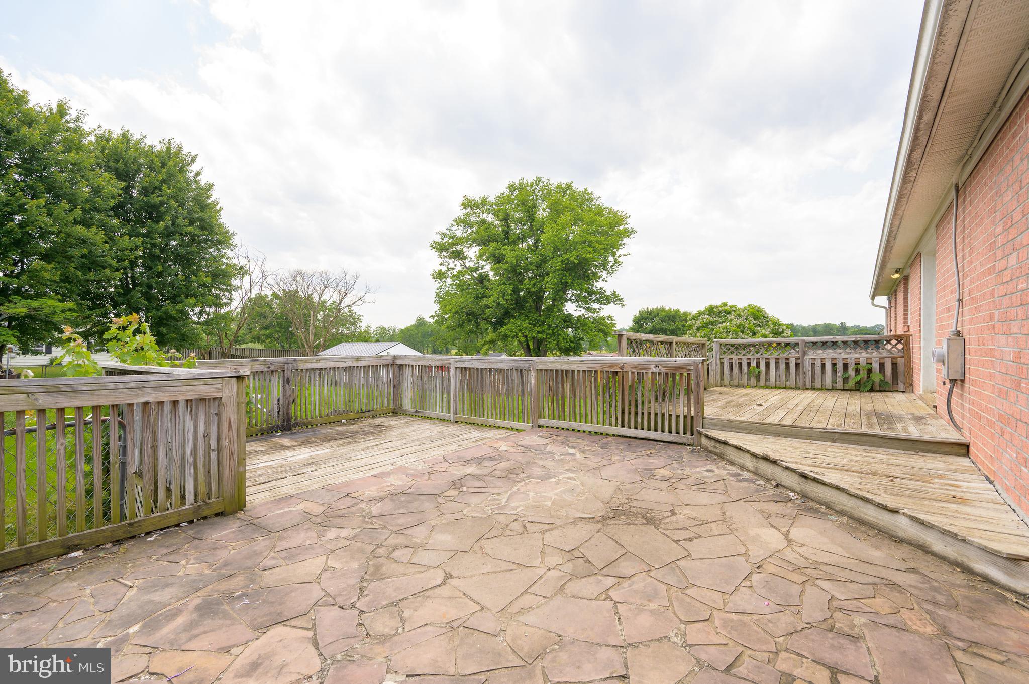 3208 Old Leetown Pike Ranson, WV 25438 - Photo 36 of 48 a view of balcony with wooden floor and fence