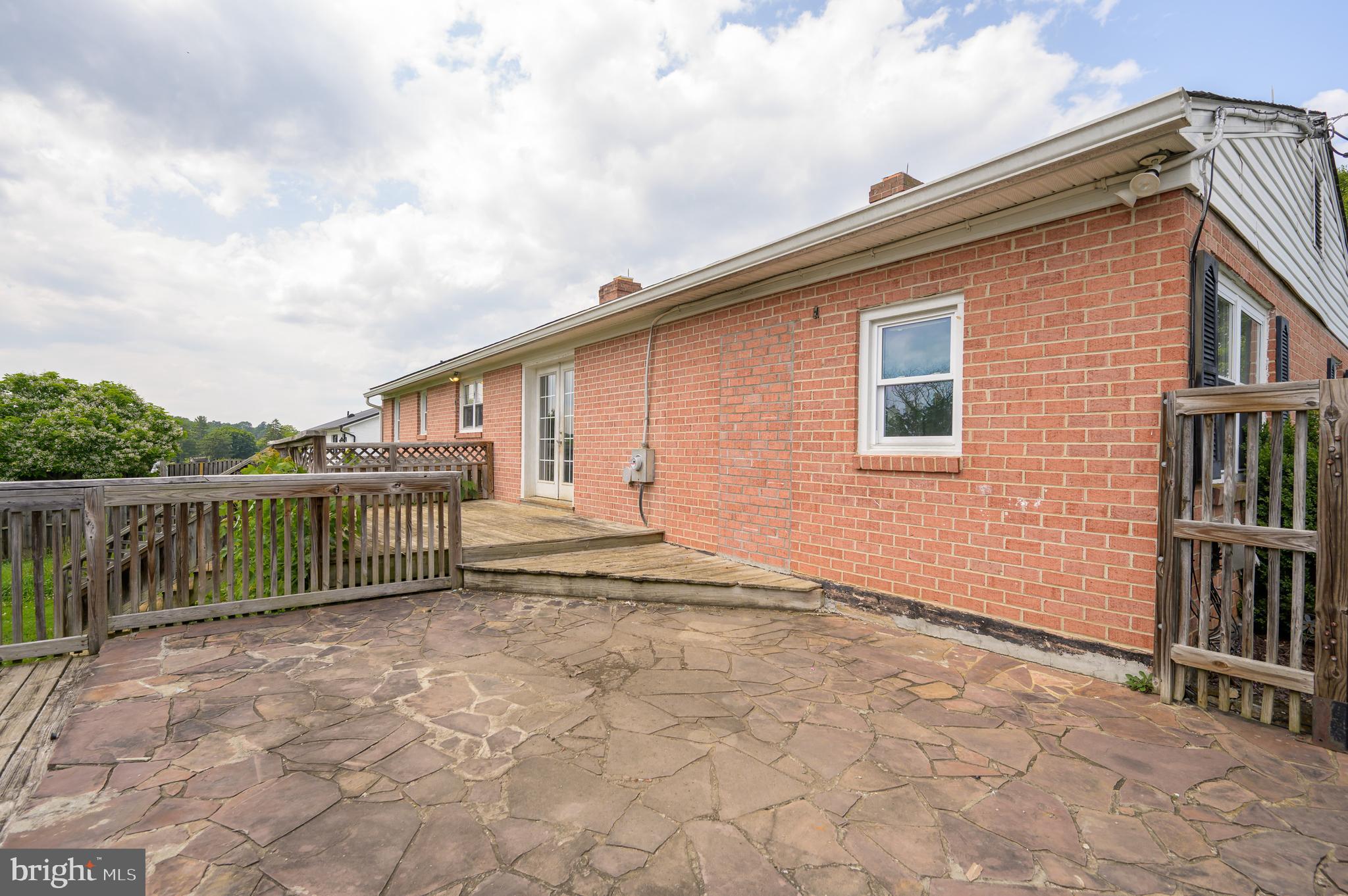 3208 Old Leetown Pike Ranson, WV 25438 - Photo 37 of 48 a backyard of a house with wooden fence