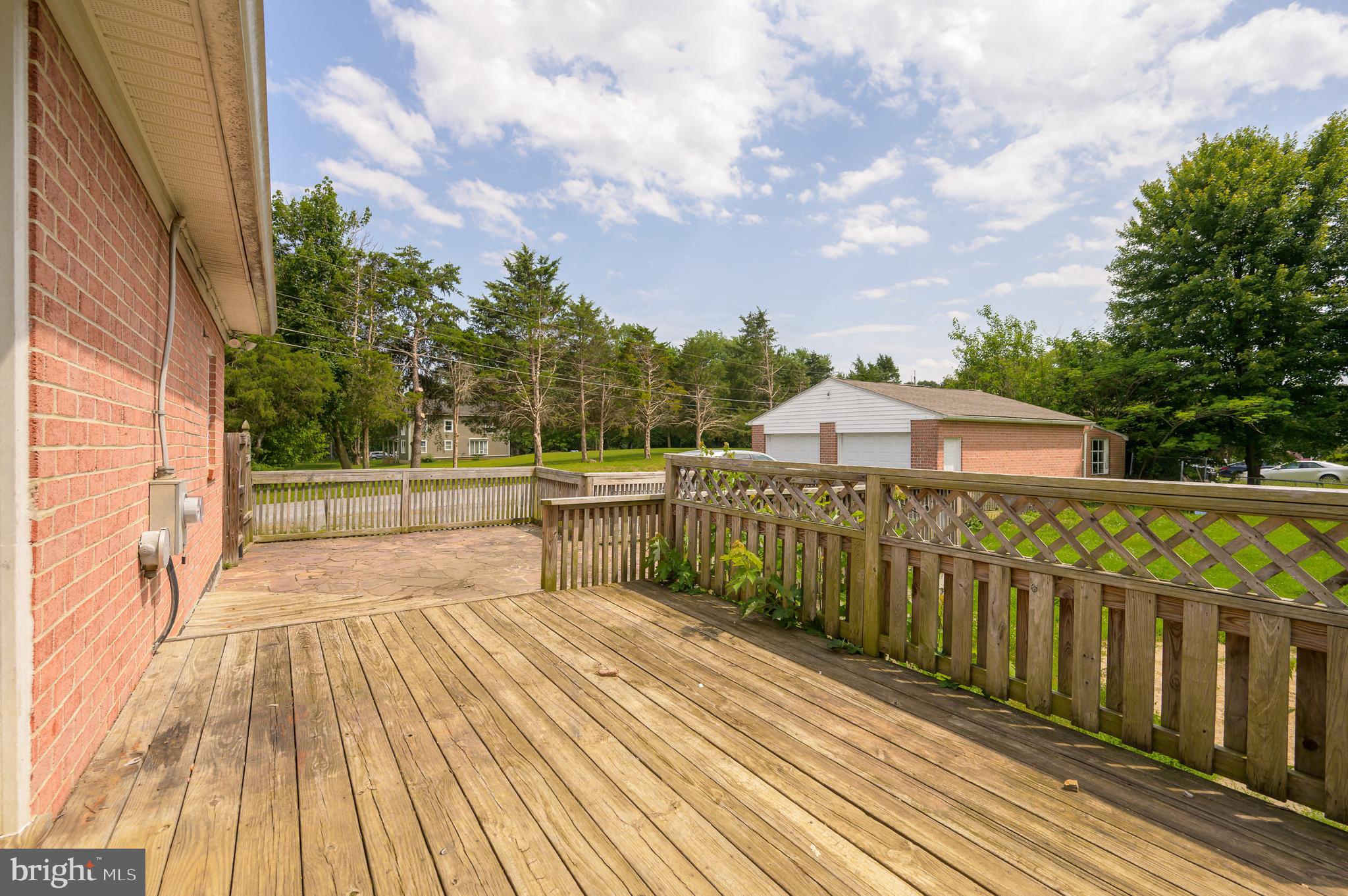 3208 Old Leetown Pike Ranson, WV 25438 - Photo 39 of 48 a view of balcony with wooden floor and fence