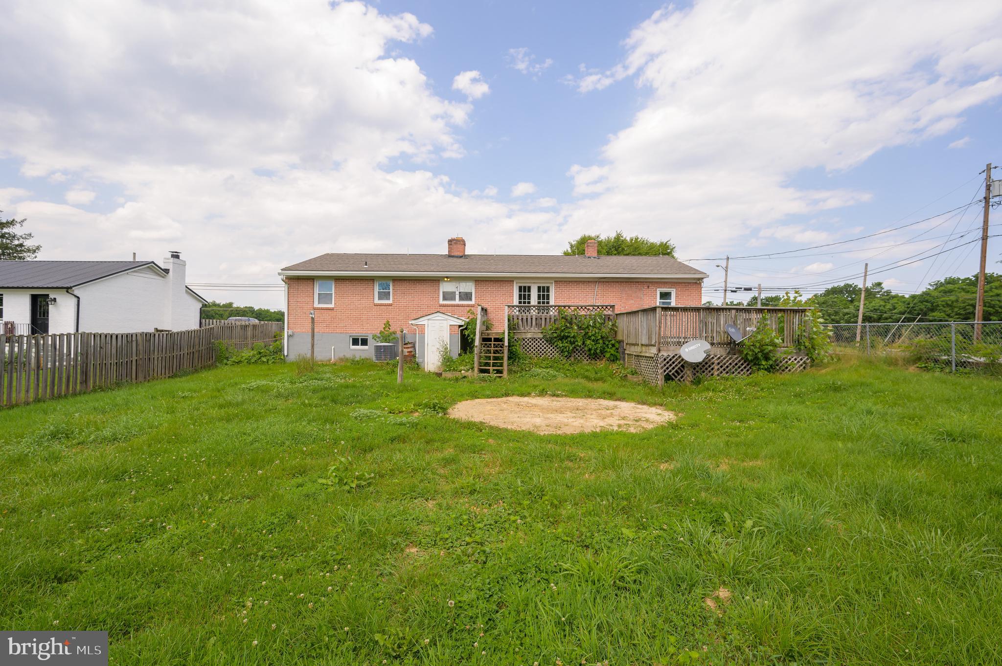 3208 Old Leetown Pike Ranson, WV 25438 - Photo 41 of 48 a view of a house with a backyard