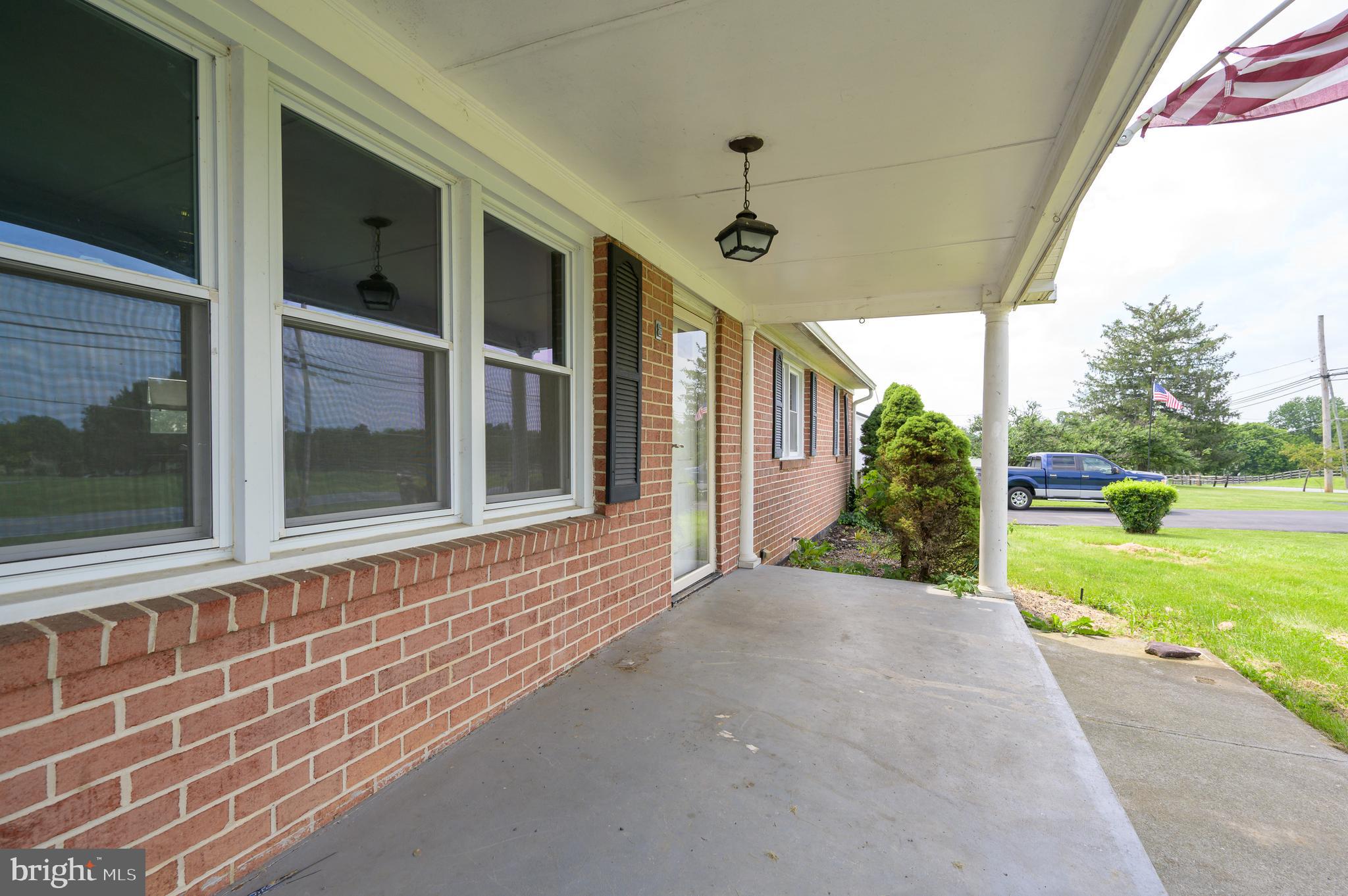 3208 Old Leetown Pike Ranson, WV 25438 - Photo 6 of 48 a view of a house with a porch