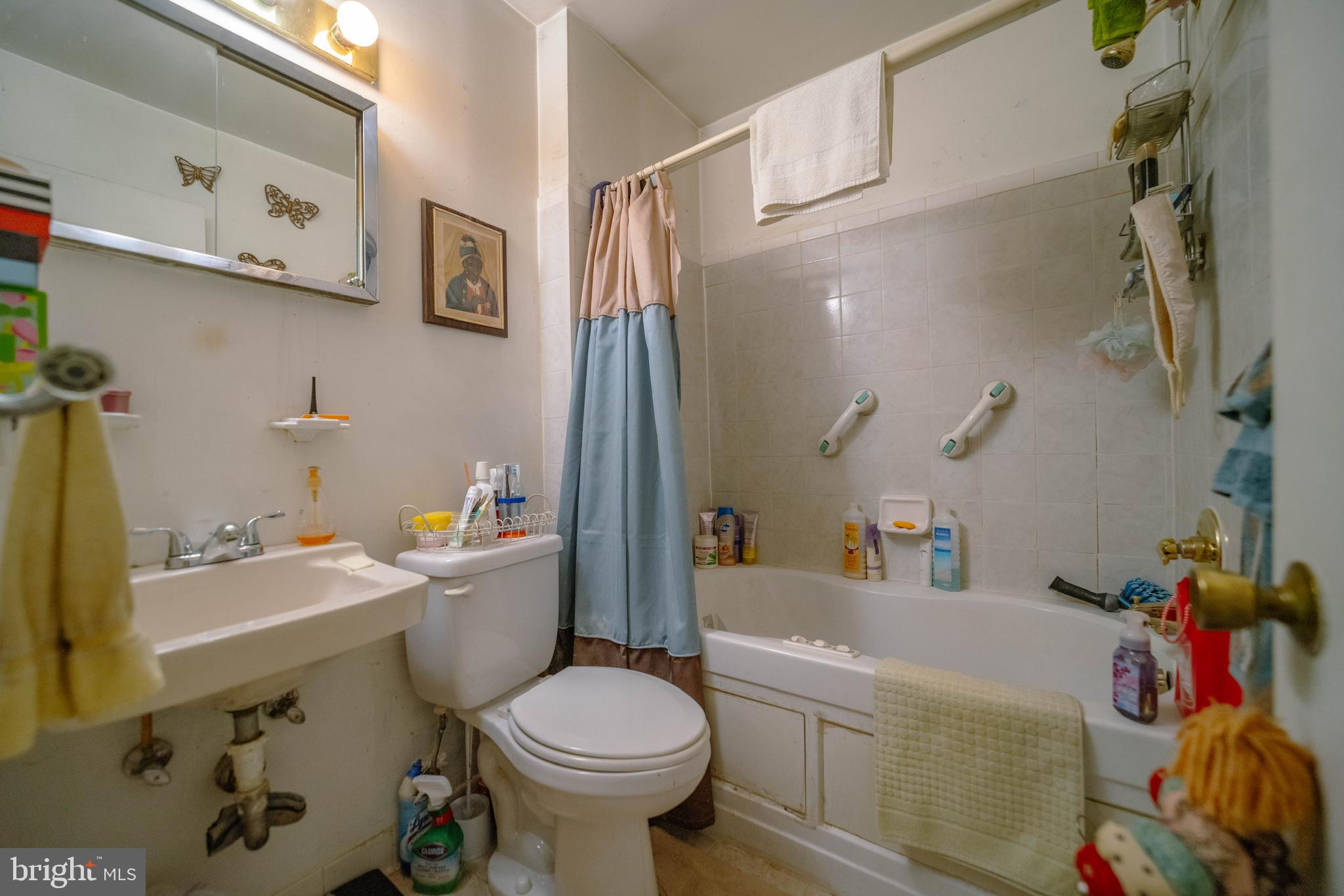 6900 Temple Hill Road Temple Hills, MD 20748 - Photo 28 of 43 a bathroom with a sink toilet and shower