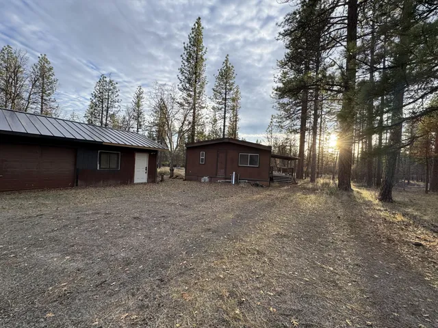a backyard of a house with lots of green space
