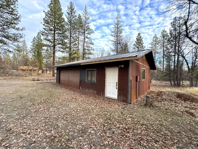 a backyard of a house with lots of green space