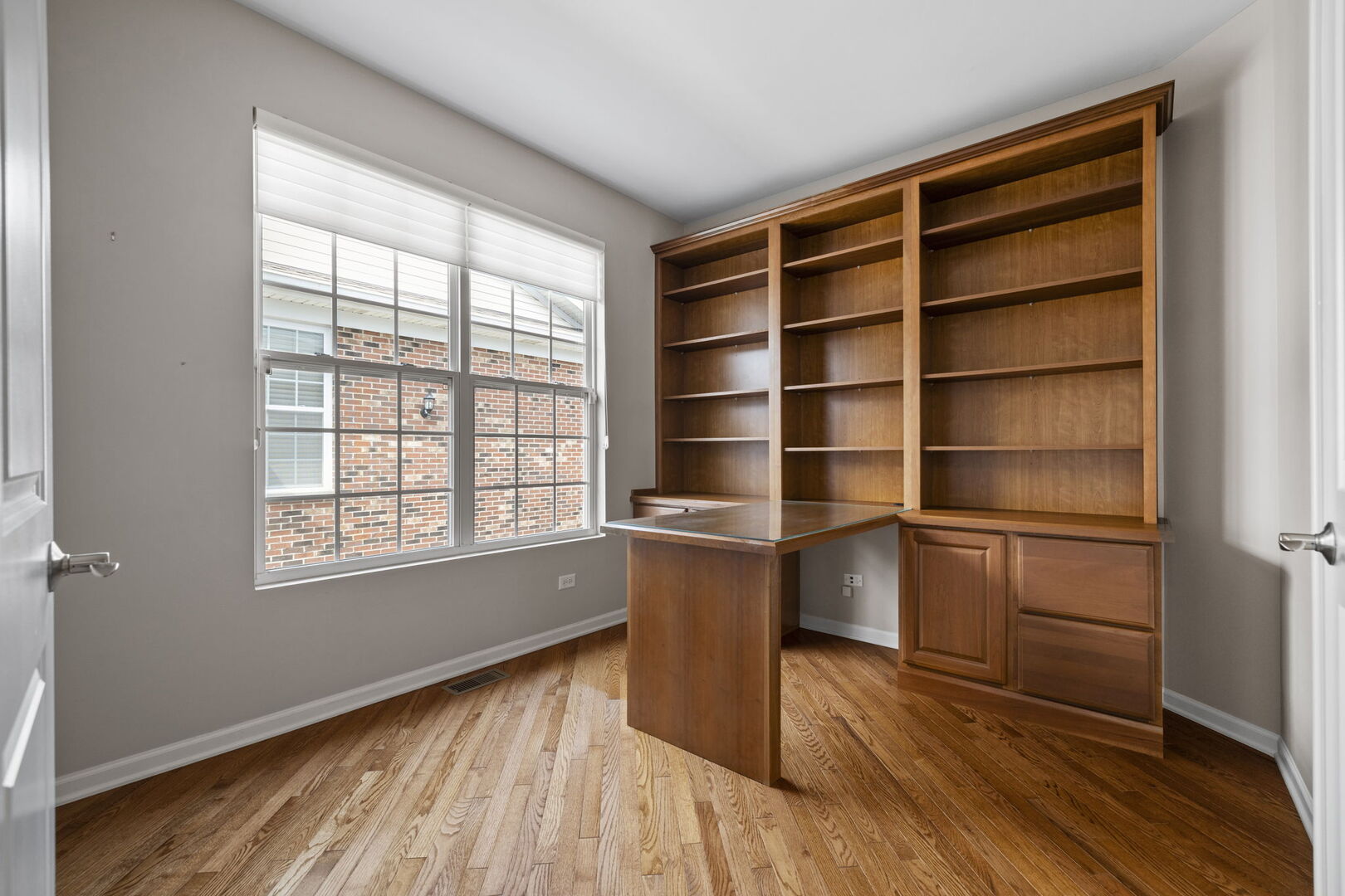 2845 Bond Circle Naperville, IL 60563 - Photo 11 of 27 a room with wooden floor and window