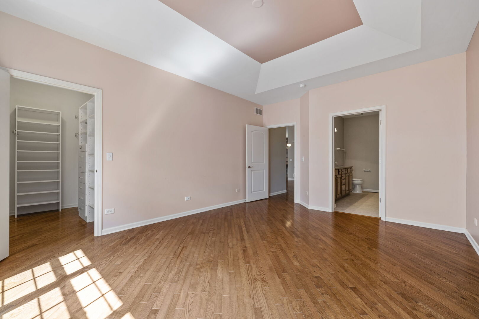 2845 Bond Circle Naperville, IL 60563 - Photo 17 of 27 an empty room with wooden floor and windows