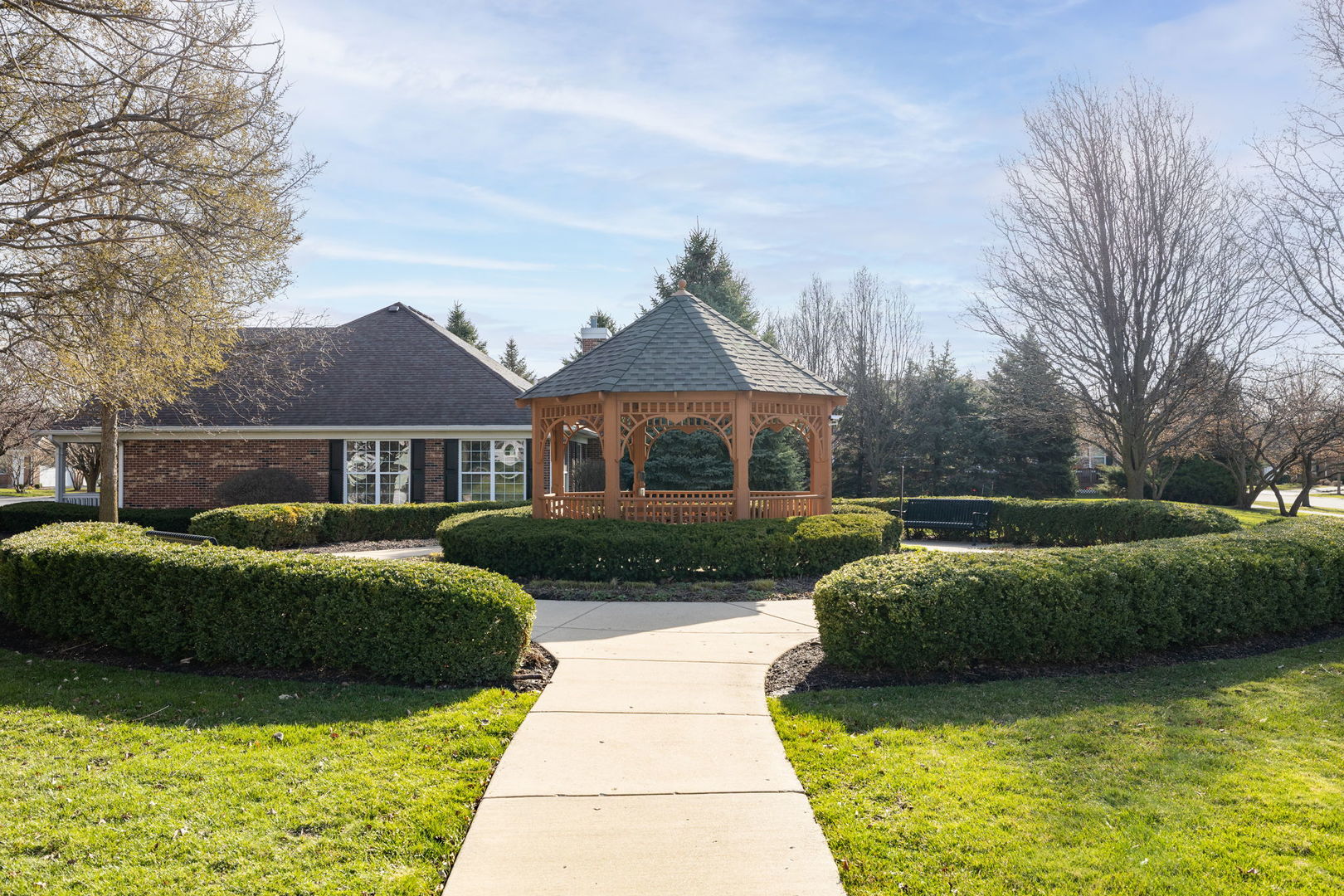 2845 Bond Circle Naperville, IL 60563 - Photo 27 of 27 a front view of a house with a garden and swimming pool