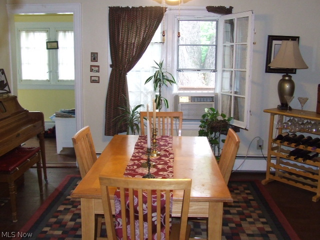 653 Ecton Road Akron, OH 44303 - Photo 7 of 25 Another view of the formal Dining room from Living room, can see small eating area to the left which is another entry to back deck.
