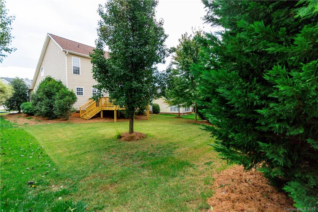 5556 Alexandrite Way Fort Mill, SC 29708 - Photo 18 of 20 a view of a house with a yard