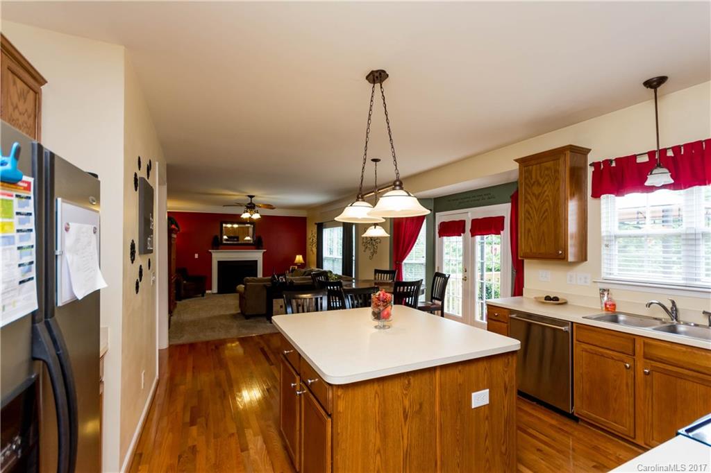 5556 Alexandrite Way Fort Mill, SC 29708 - Photo 6 of 20 a kitchen with a sink a counter space appliances and a counter top space