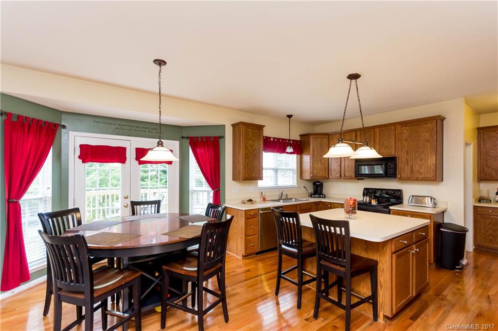 5556 Alexandrite Way Fort Mill, SC 29708 - Photo 8 of 20 a view of a dining room and livingroom