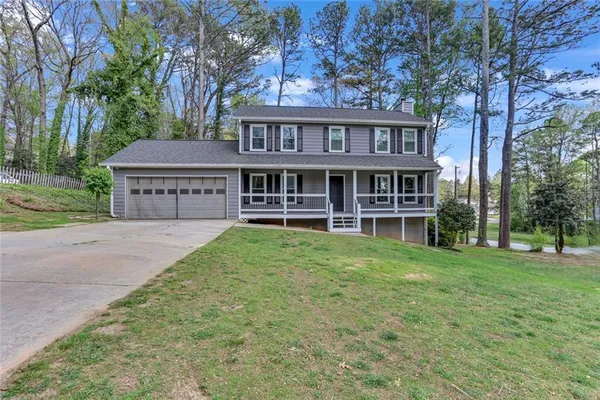 front view of a house with a yard