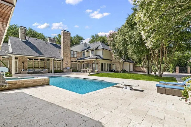 a view of a building with a swimming pool