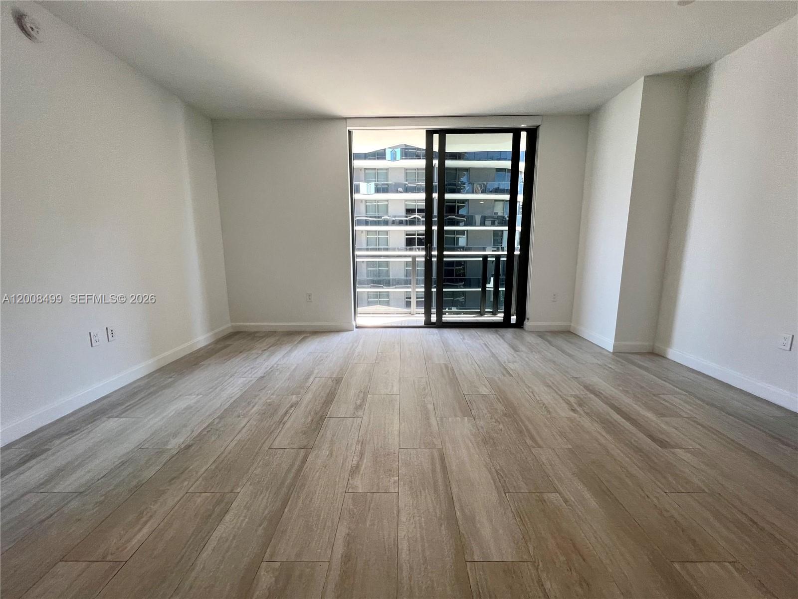 55 Southwest 9th Street, Unit 2702 Miami, FL 33130 - Photo 2 of 36 wooden floor in a room