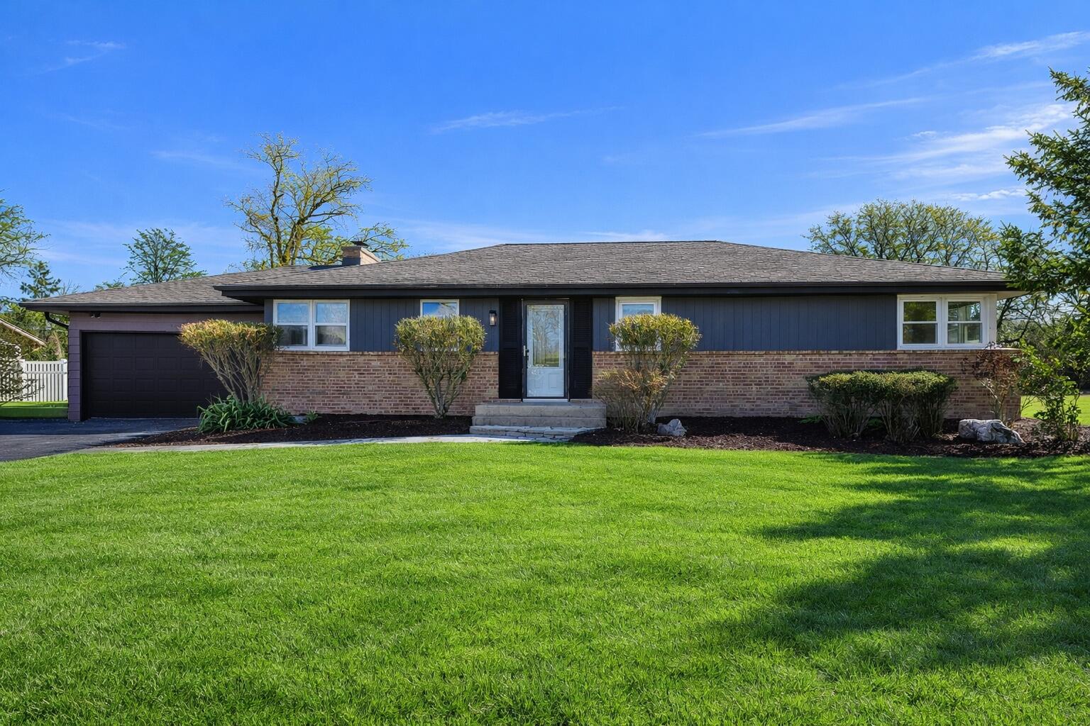 9032 North Regent Road Bayside, WI 53217 - Photo 2 of 30 Front of Home - Virtually Enhanced