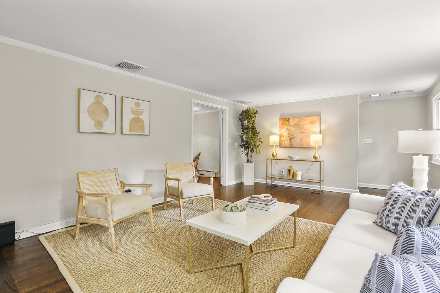 210 Tokeneke Road Darien, CT 06820 - Photo 11 of 24 a living room with furniture and a table