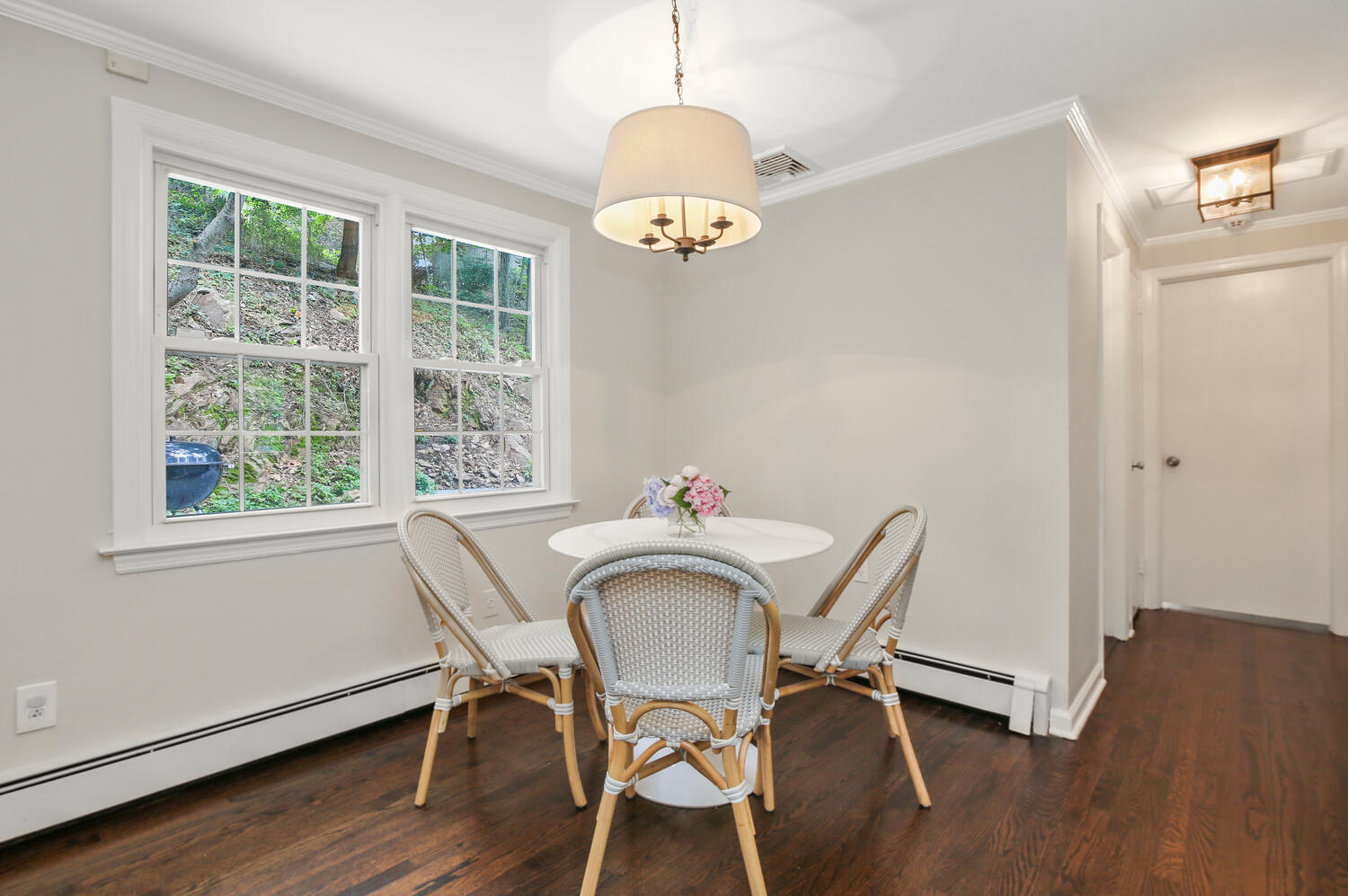 210 Tokeneke Road Darien, CT 06820 - Photo 15 of 24 a view of a dining room with furniture window and wooden floor