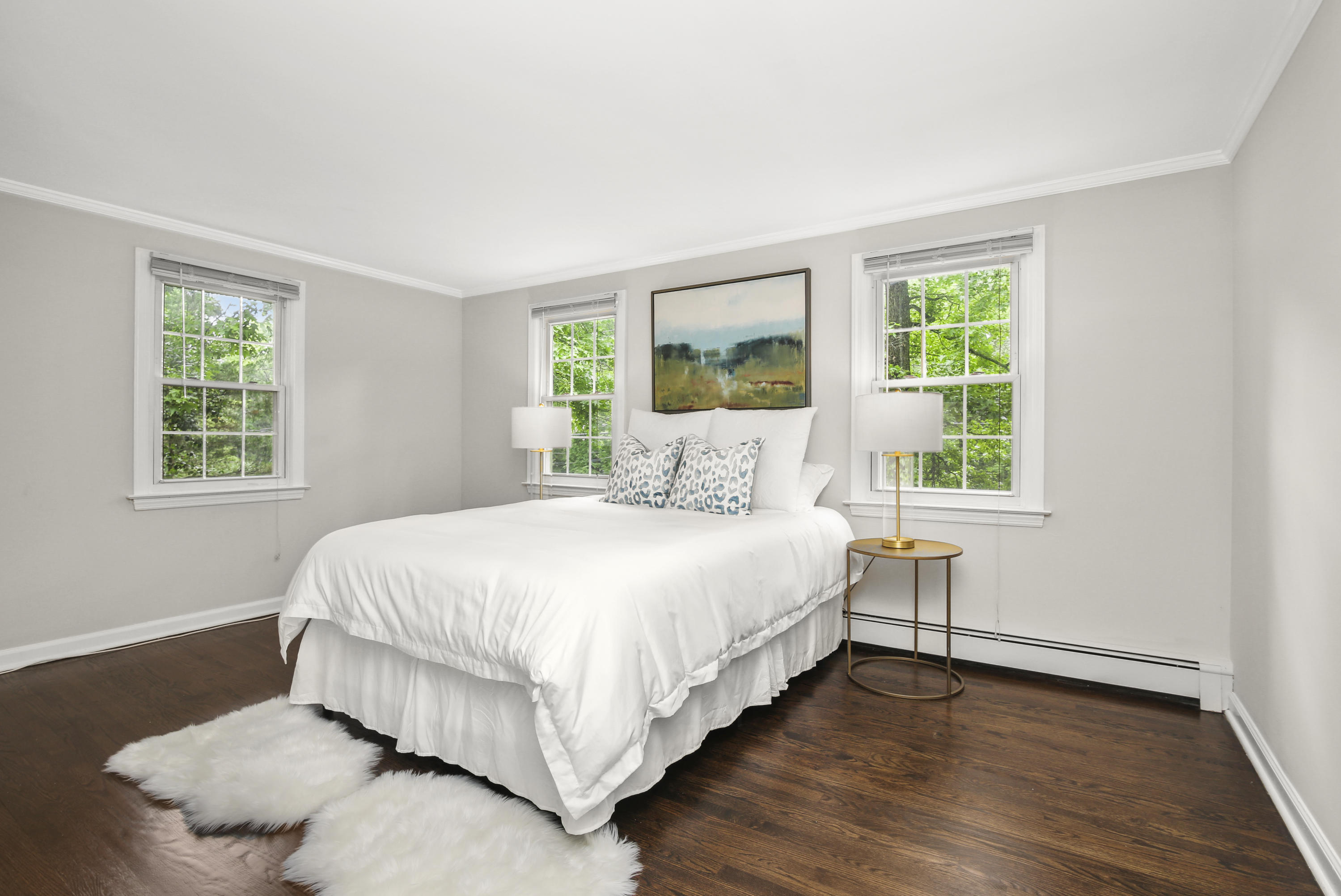 210 Tokeneke Road Darien, CT 06820 - Photo 18 of 24 a bedroom with a bed and window