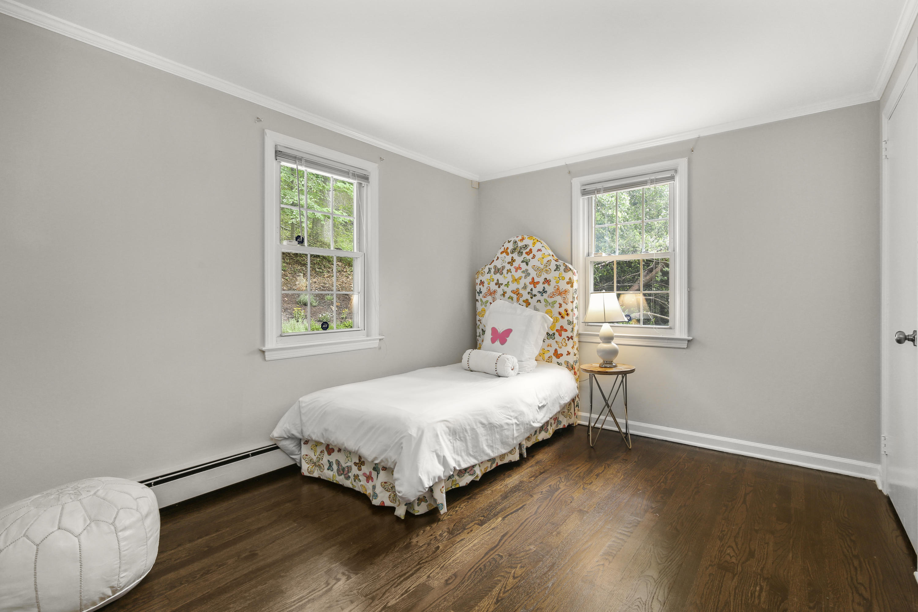 210 Tokeneke Road Darien, CT 06820 - Photo 20 of 24 a bedroom with a bed and a window