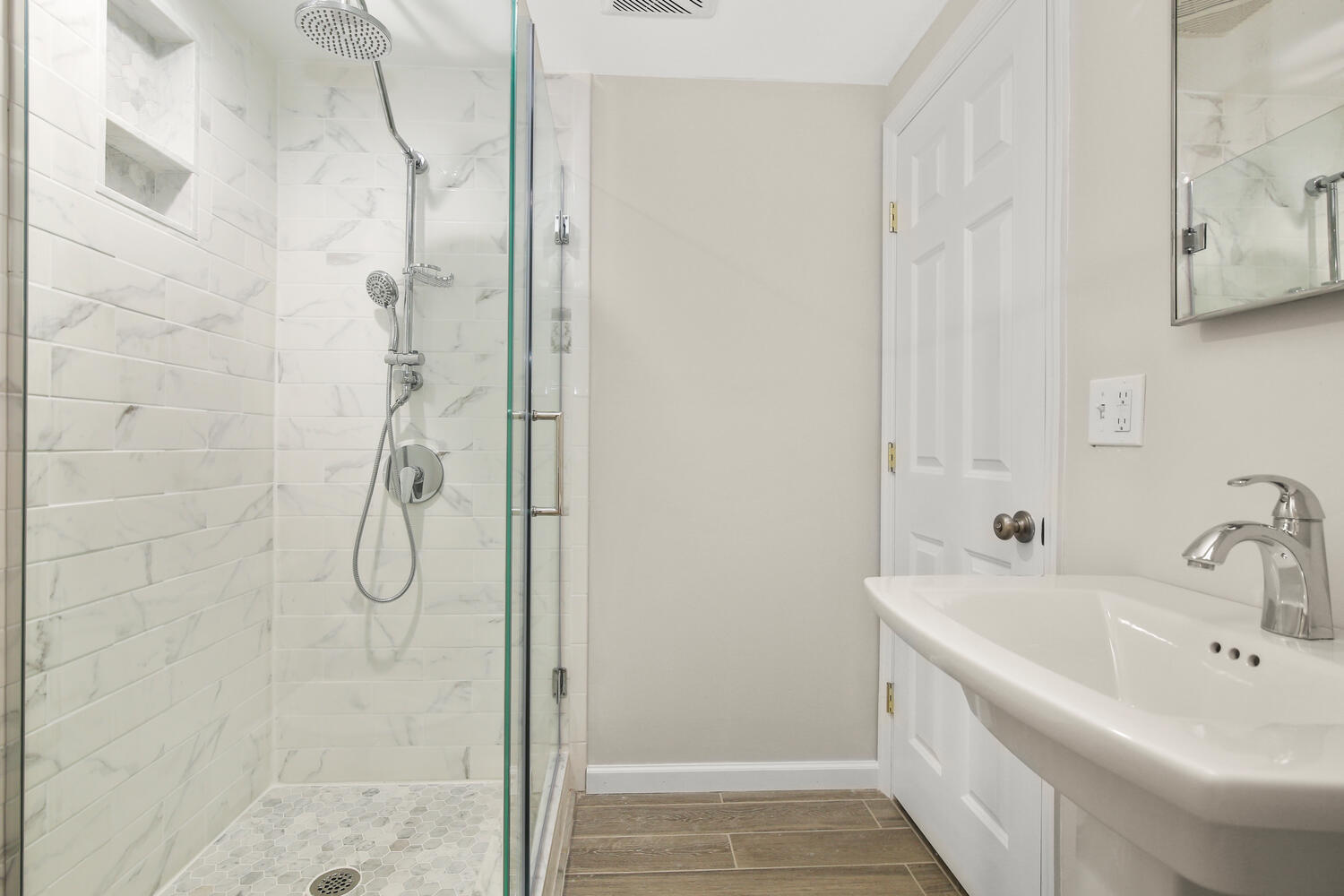 210 Tokeneke Road Darien, CT 06820 - Photo 6 of 24 a bathroom with a bathtub and shower