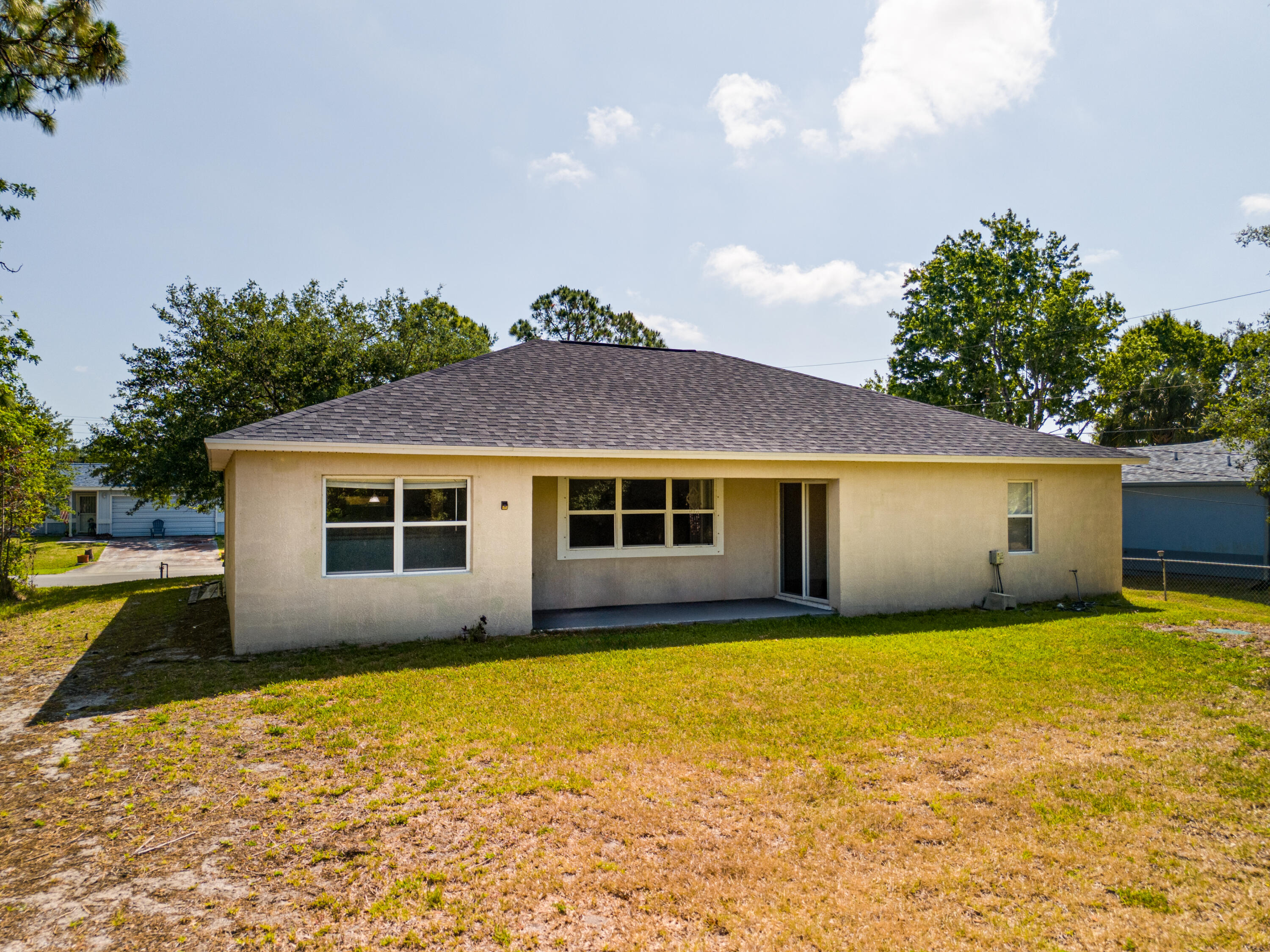 500 Topeka Road Southwest Palm Bay, FL 32908 - Photo 3 of 12 a view of a house with garden