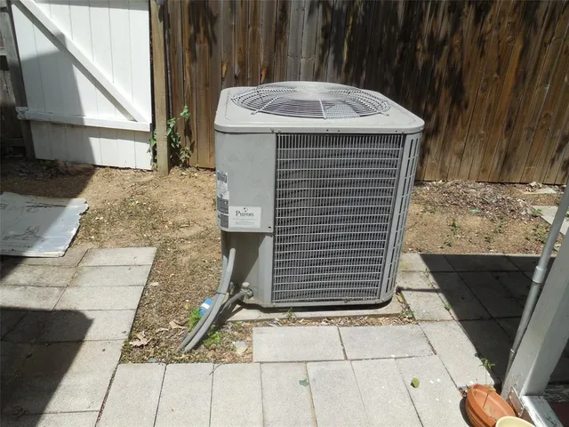 a front view of a house with parking space