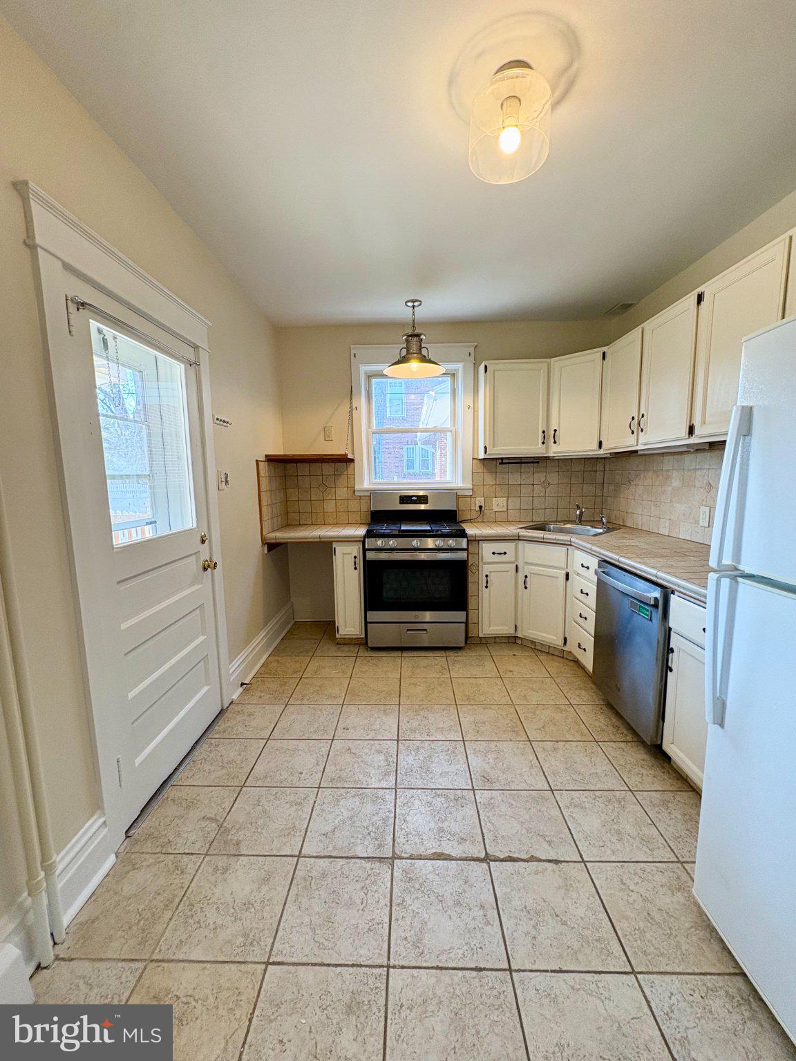 616 North Front Street Wormleysburg, PA 17043 - Photo 12 of 25 a kitchen with a cabinets and appliances
