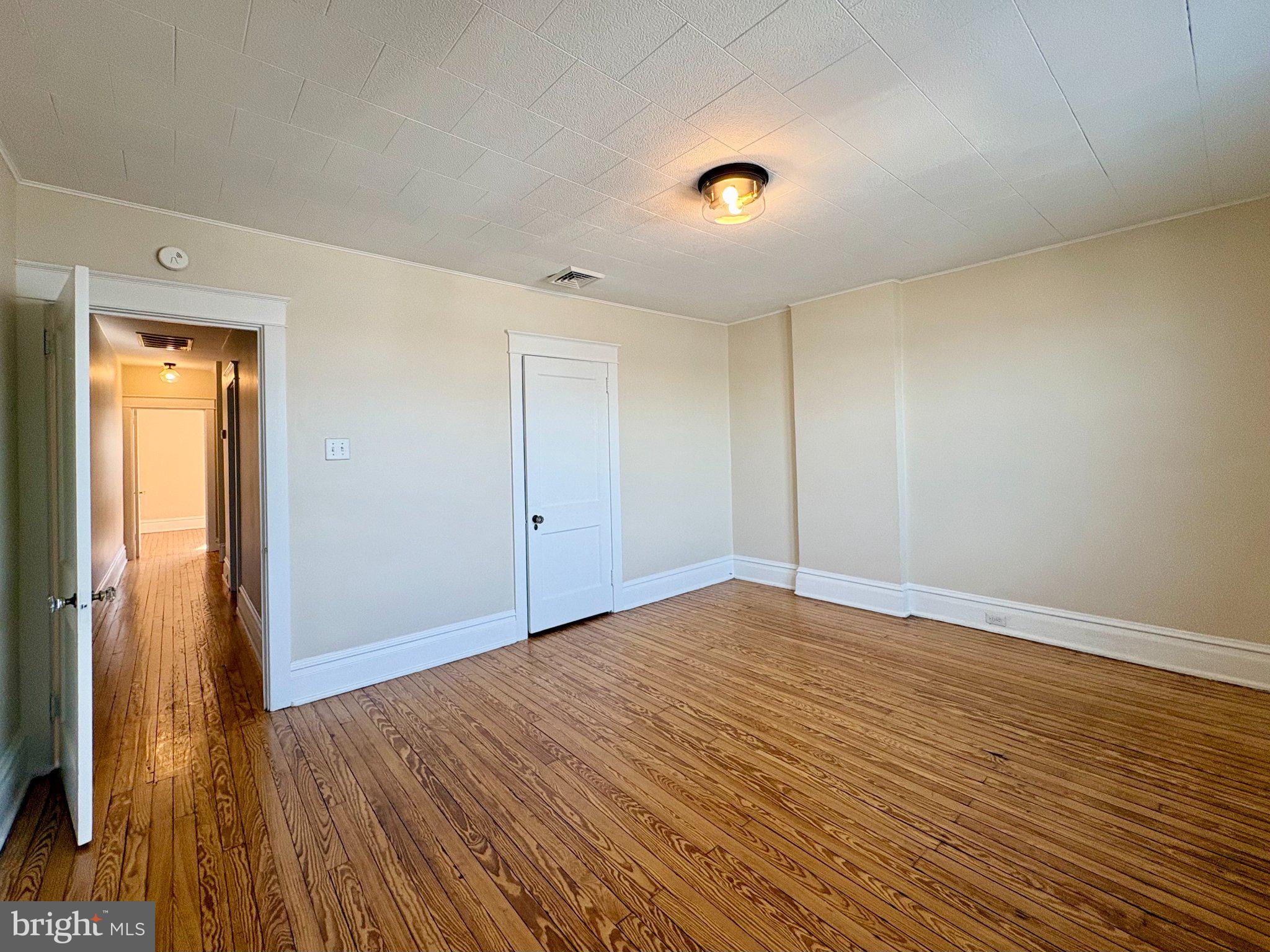 616 North Front Street Wormleysburg, PA 17043 - Photo 25 of 25 a view of empty room with wooden floor
