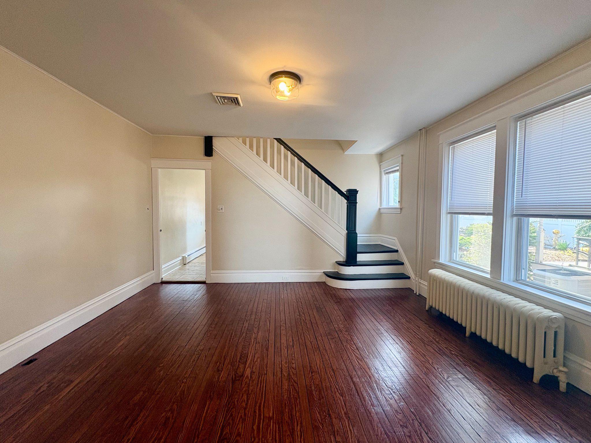 616 North Front Street Wormleysburg, PA 17043 - Photo 7 of 25 a view of empty room with wooden floor and fan