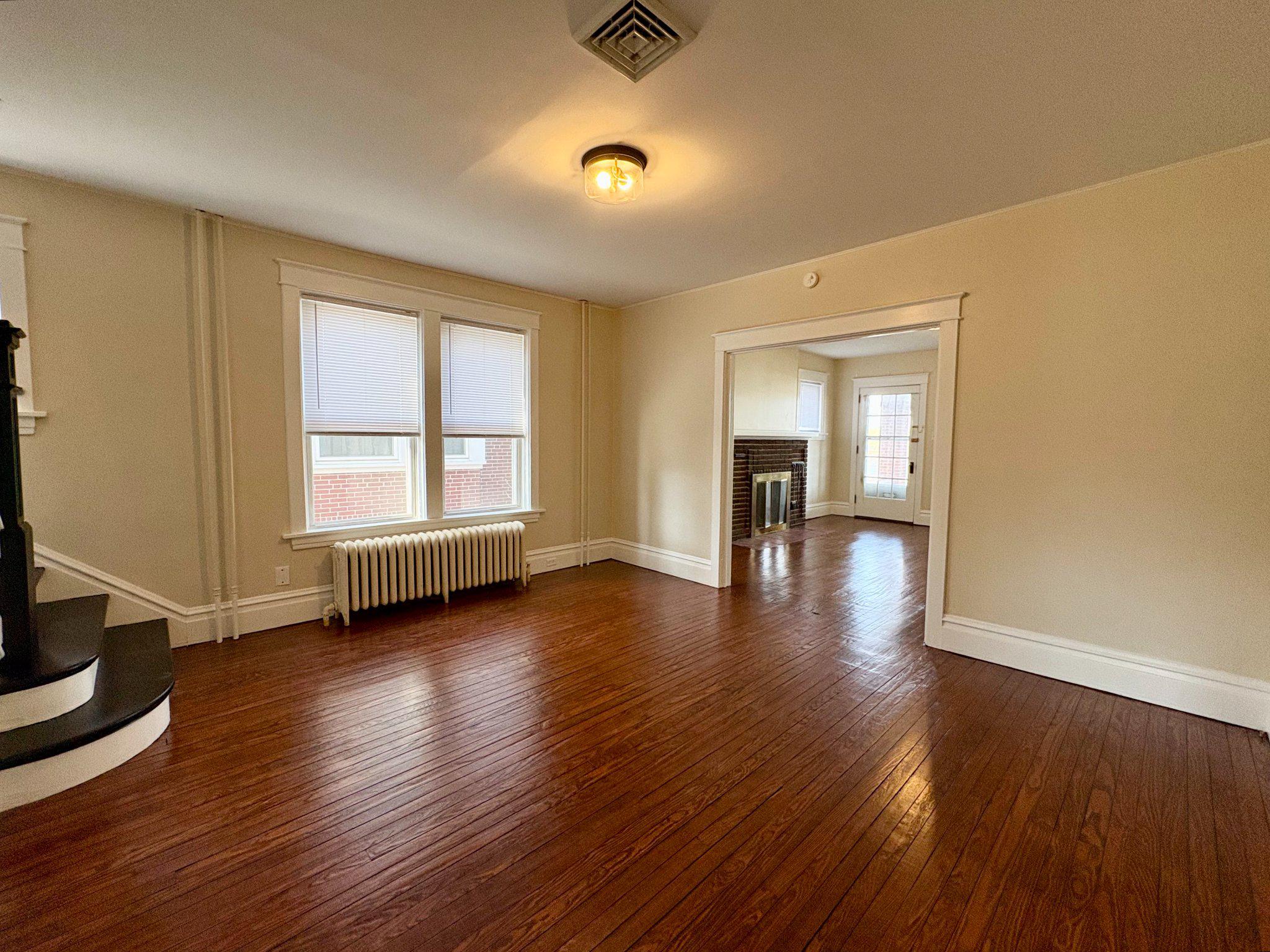 616 North Front Street Wormleysburg, PA 17043 - Photo 9 of 25 a view of empty room with wooden floor and fan