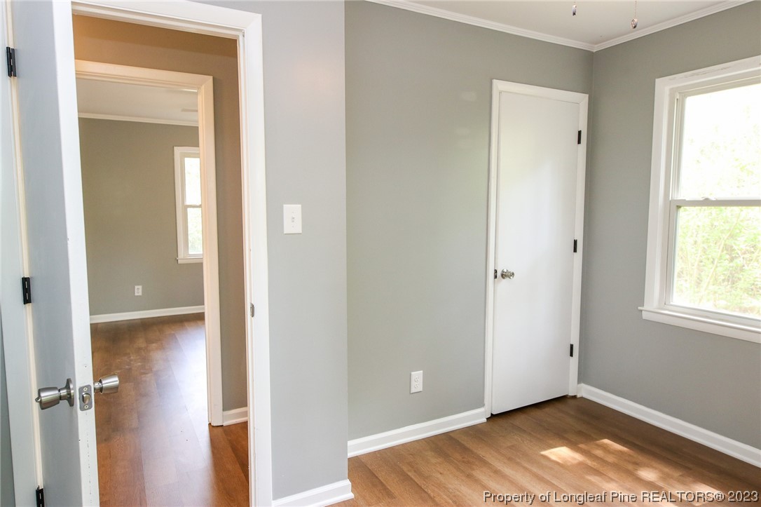 782 Horne Road Rowland, NC 28383 - Photo 15 of 27 an empty room with windows and closet