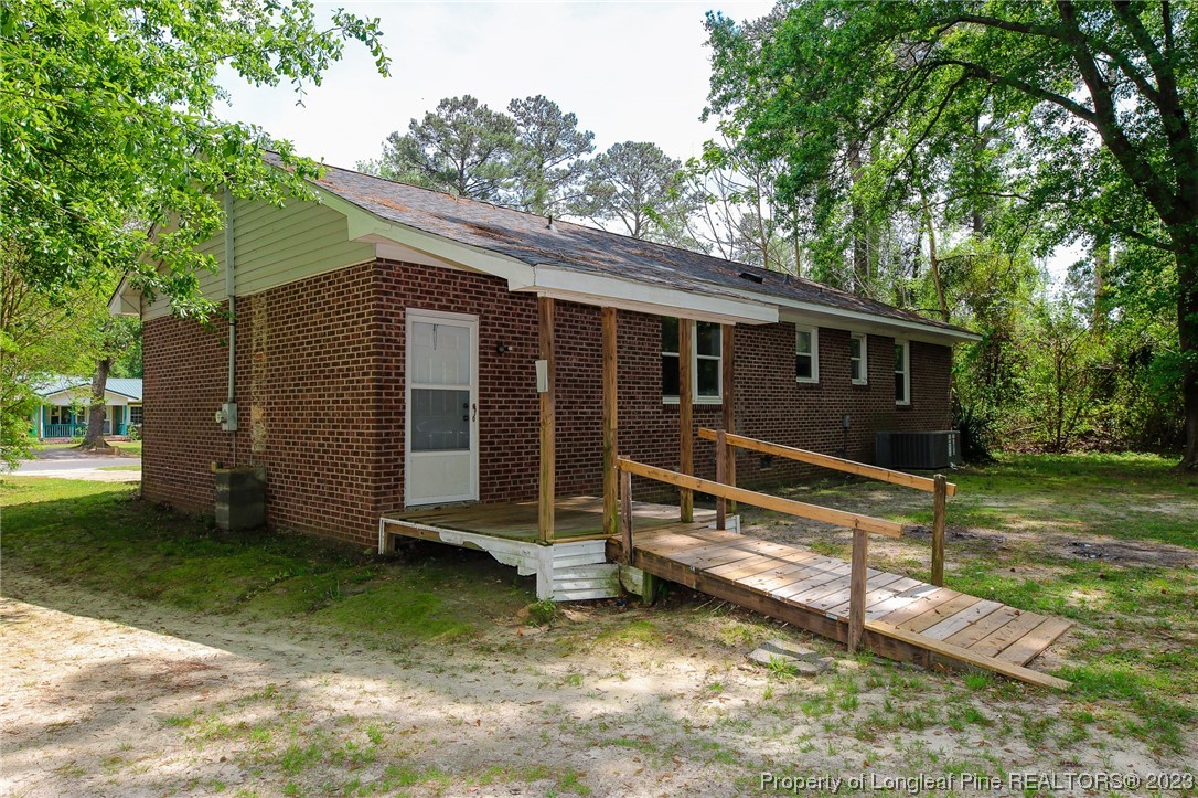 782 Horne Road Rowland, NC 28383 - Photo 20 of 27 a view of a house with a yard