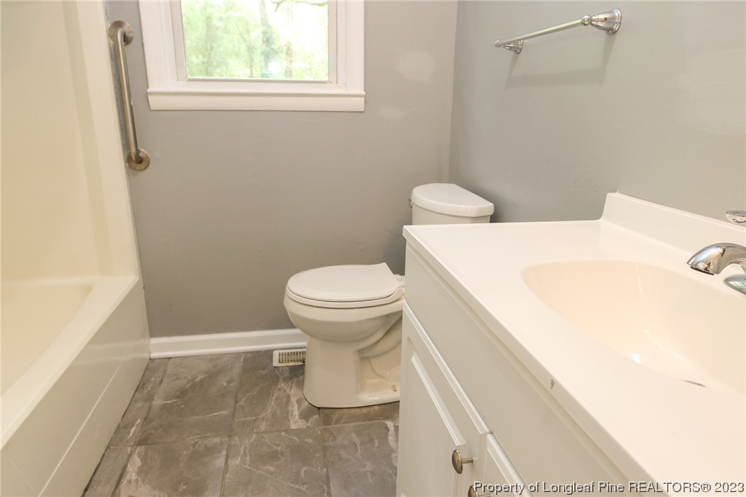 782 Horne Road Rowland, NC 28383 - Photo 10 of 27 a bathroom with a sink and a toilet