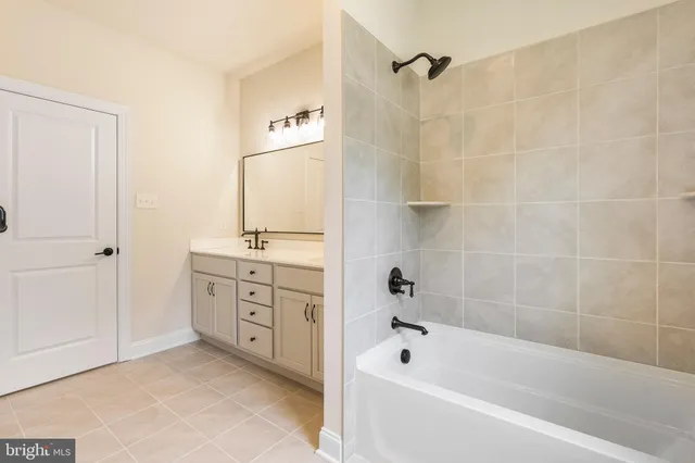 a utility room with sink dryer and washer