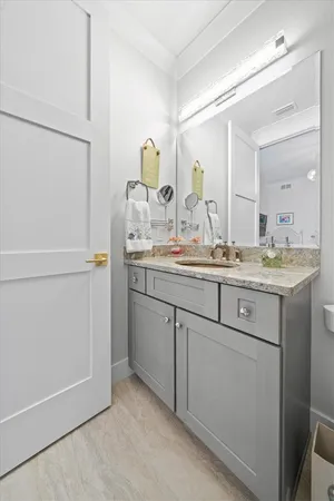 a utility room with cabinets washer and dryer